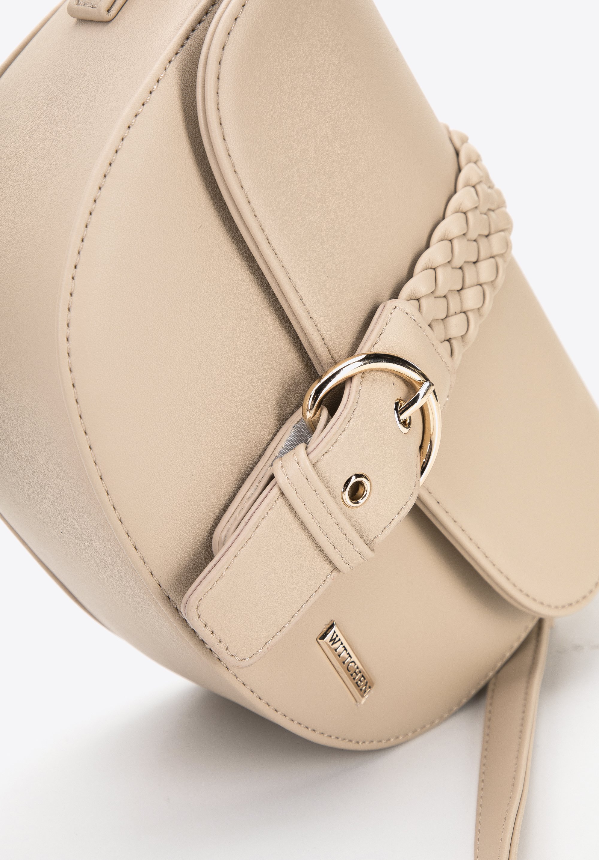 Damska listonoszka z ozdobną plecionką