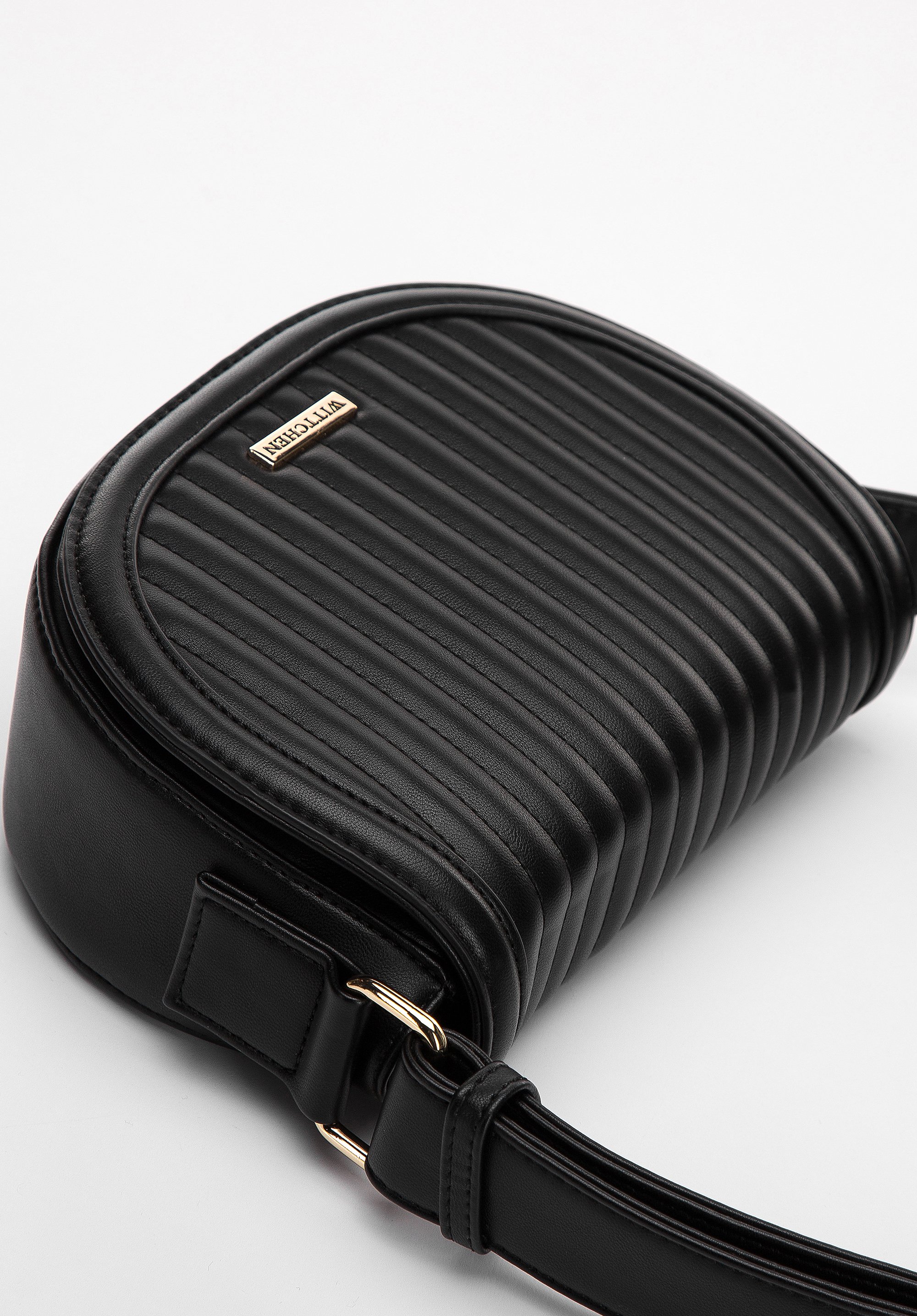 Damska listonoszka saddle bag z pionowym pikowaniem