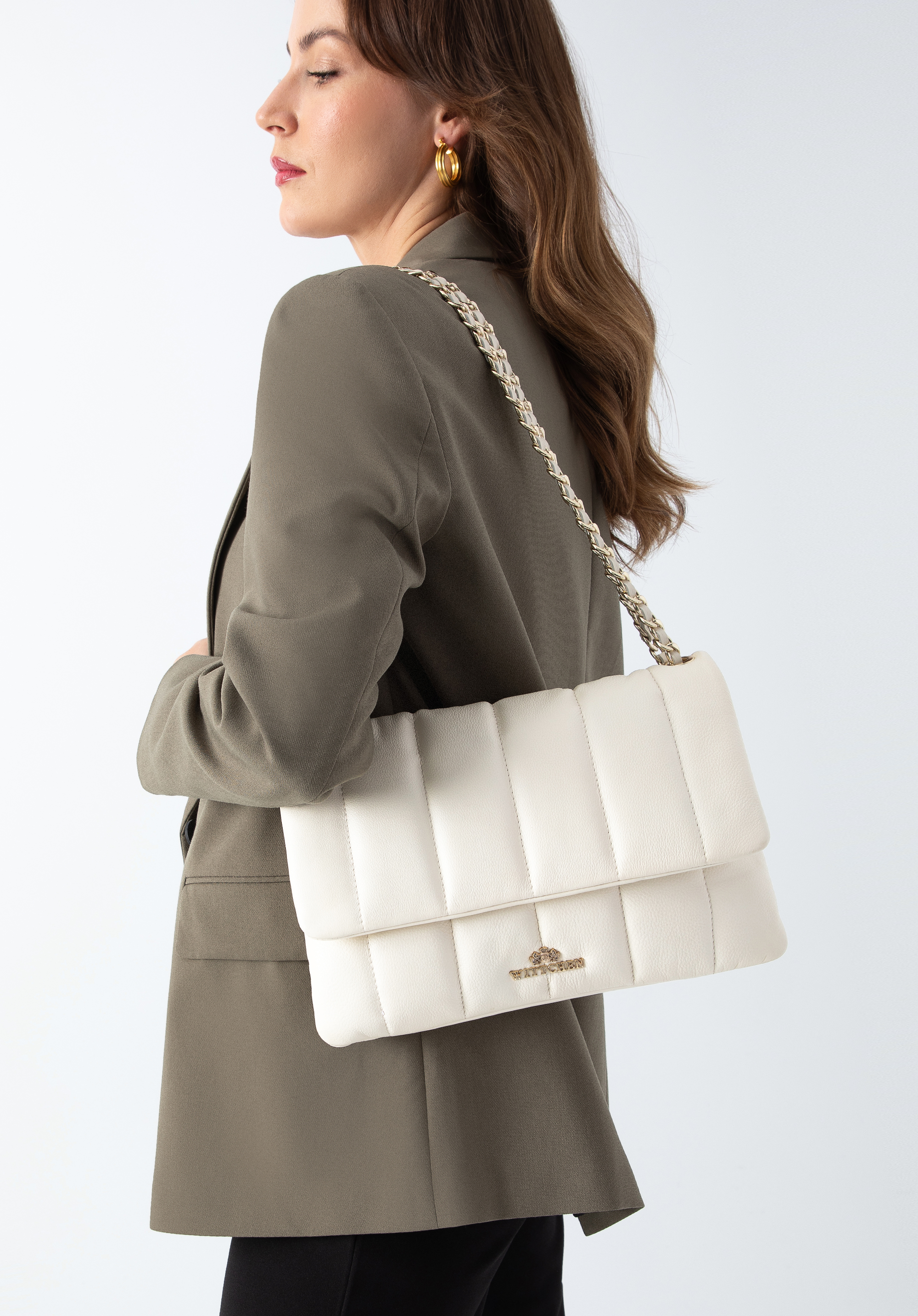 Damska torebka skórzana z szerokimi pikowaniami