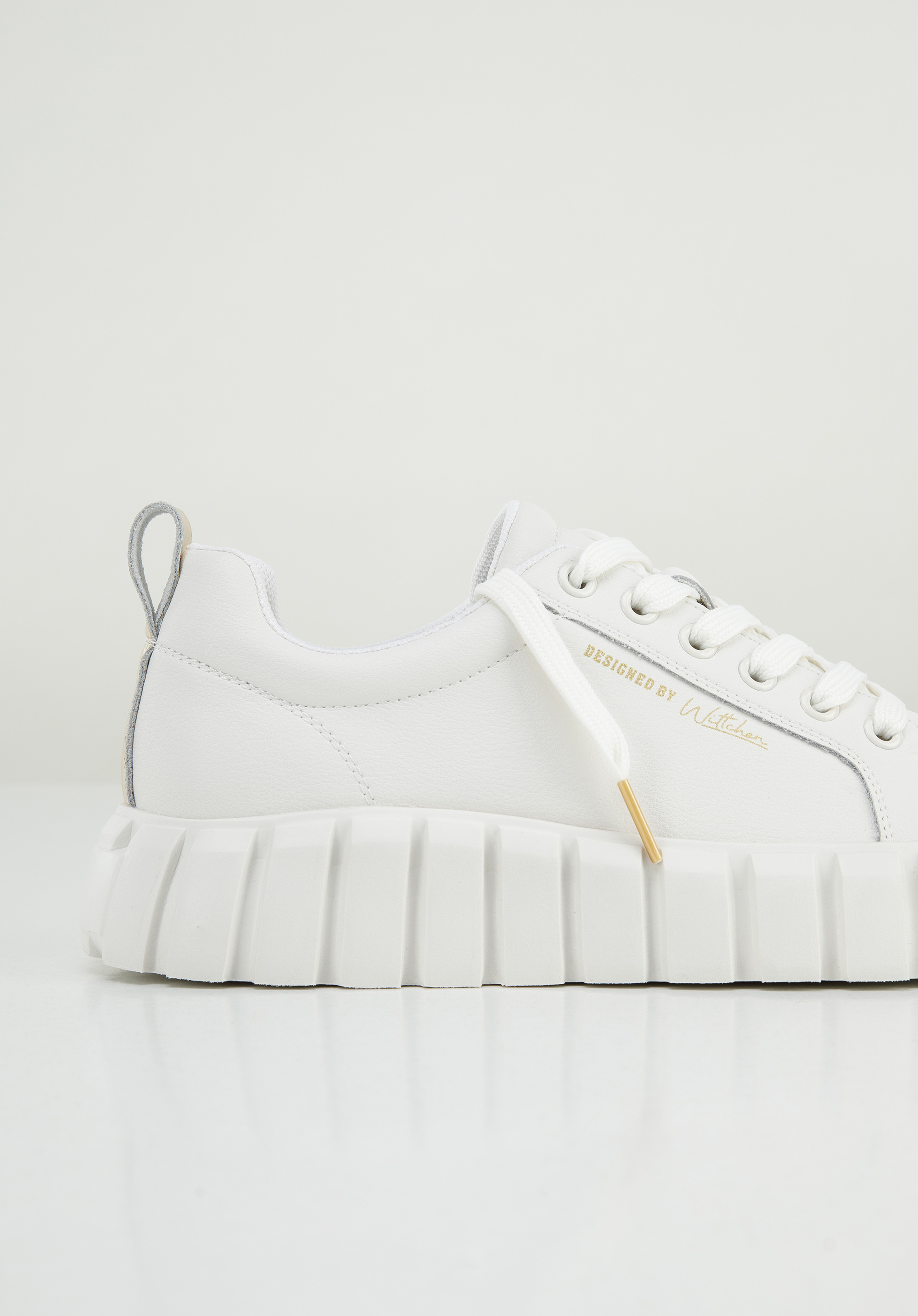 Damskie sneakersy ze skóry na grubej podeszwie