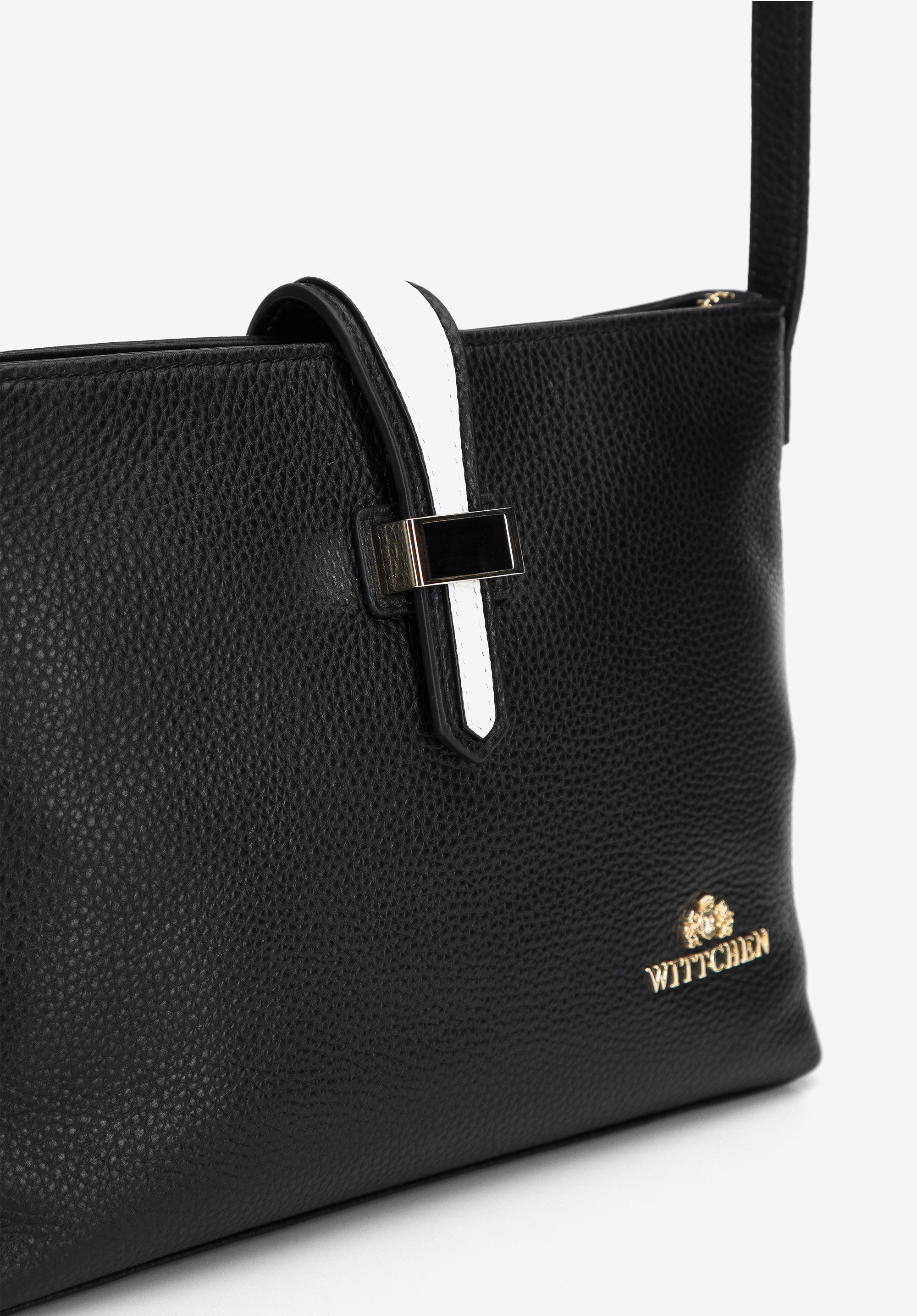 Damska listonoszka ze skóry z kontrastowym zapięciem