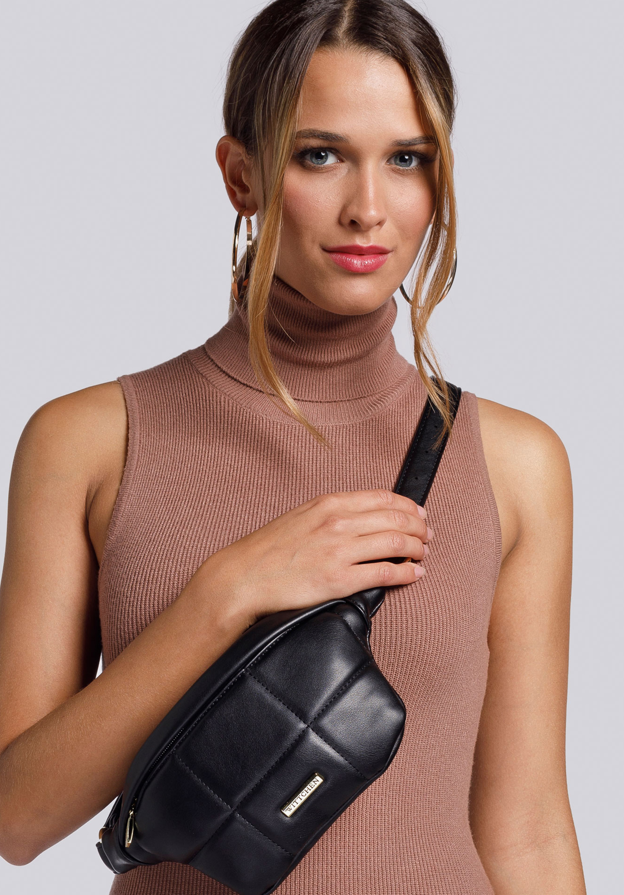 Damska torebka nerka z geometrycznym pikowaniem