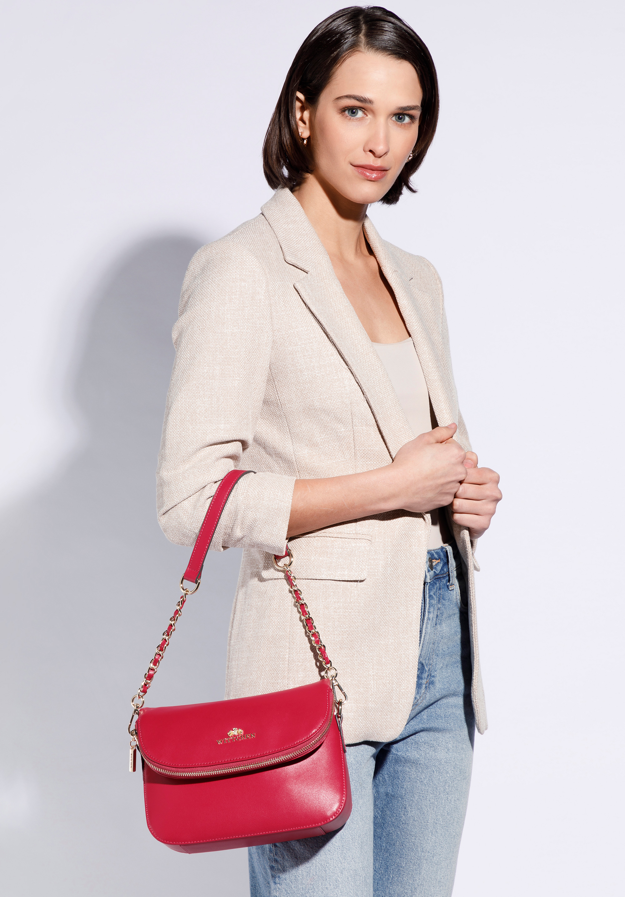 Damska listonoszka skórzana z kieszenią w klapie mała