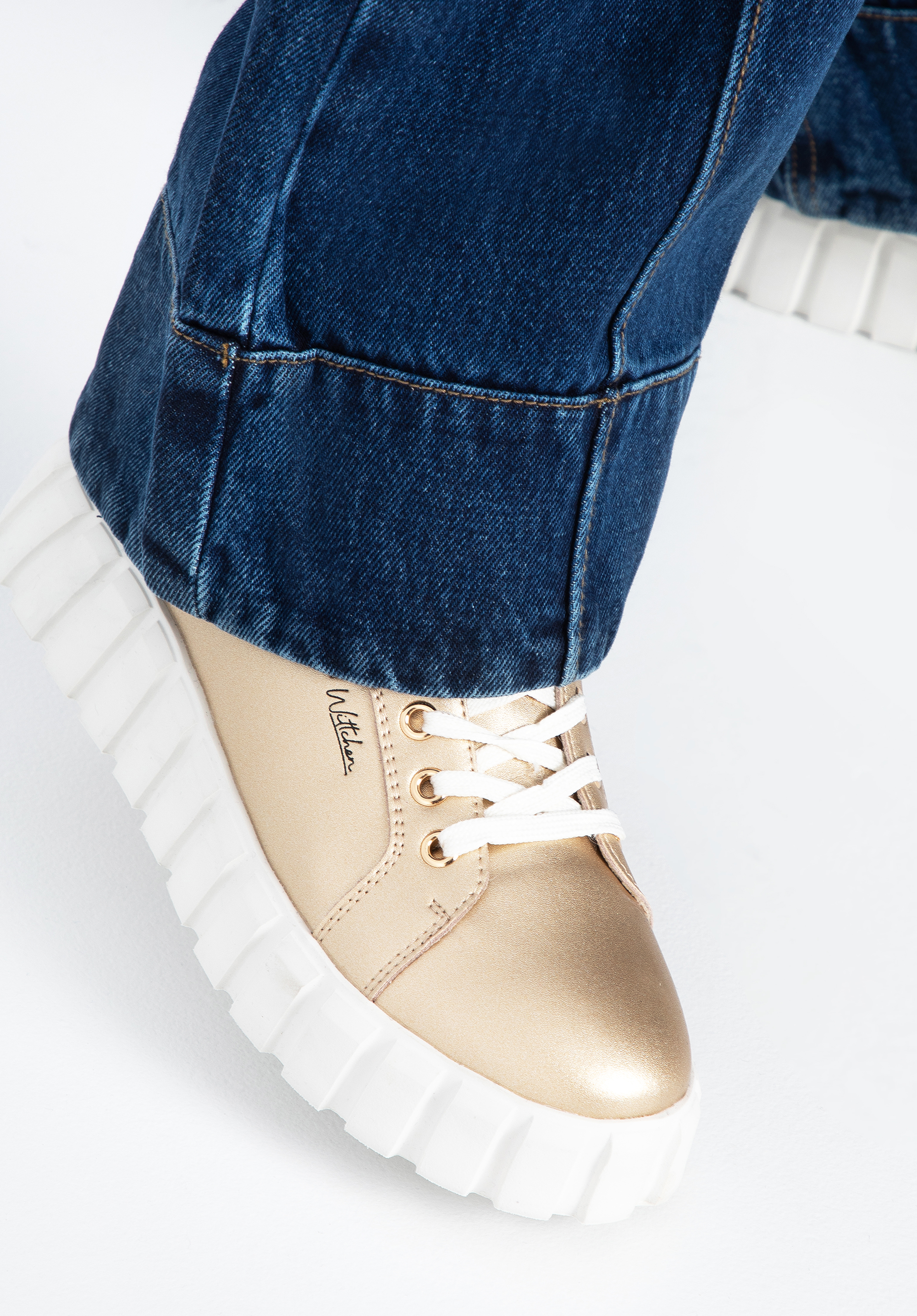 Damskie sneakersy skórzane na grubej platformie