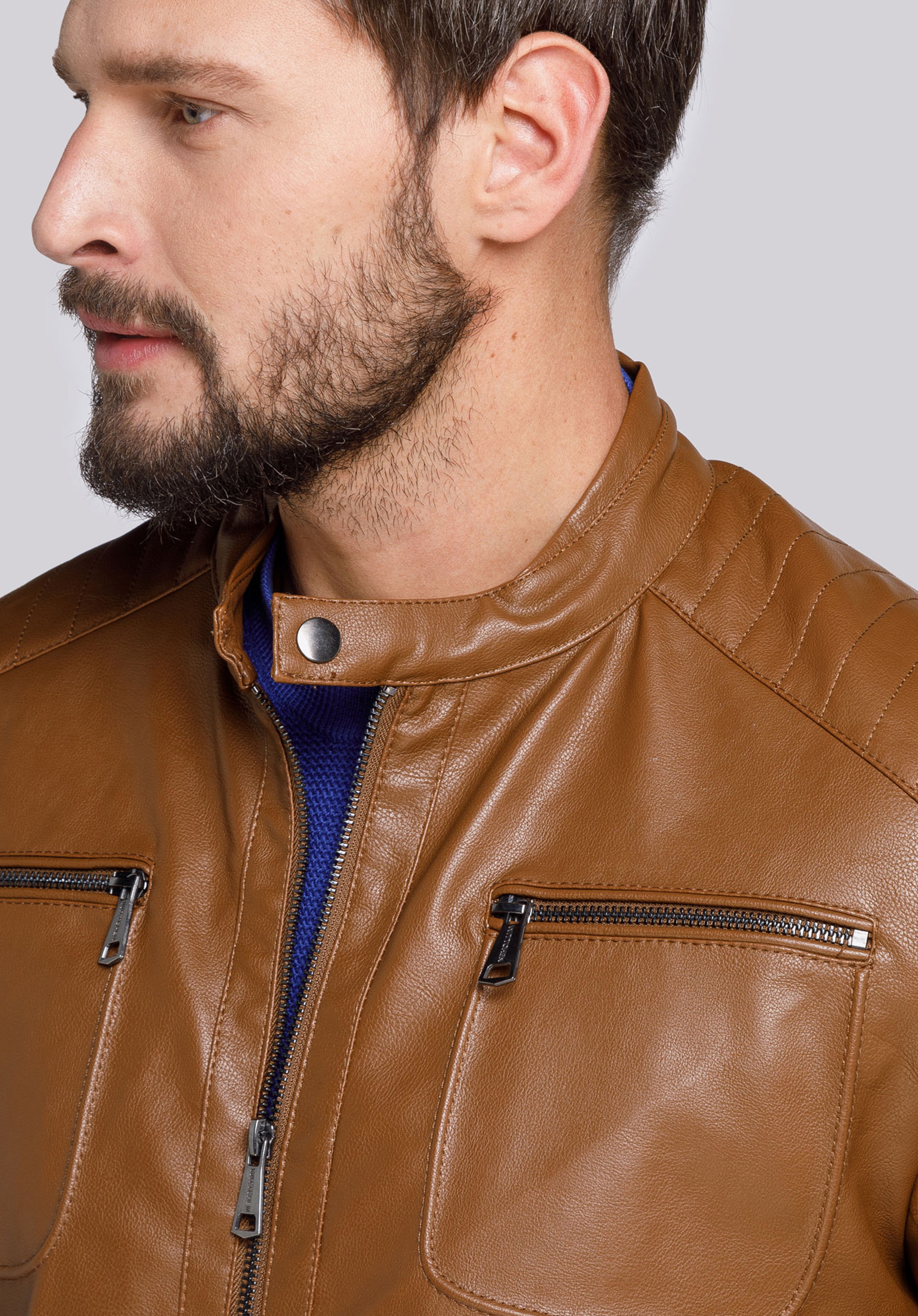 Męska kurtka z obszytymi kieszeniami