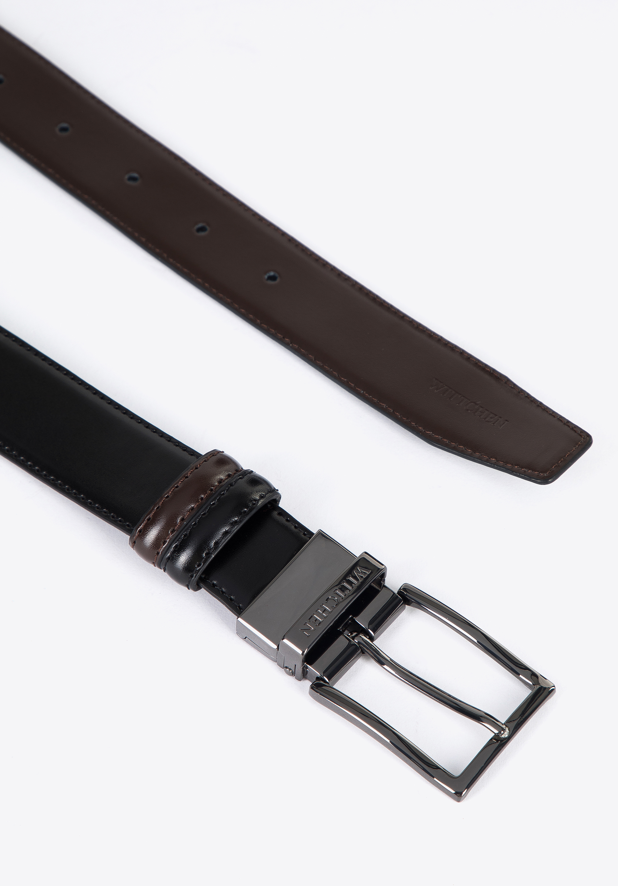 Męski pasek skórzany dwustronny ze stębnowaniem