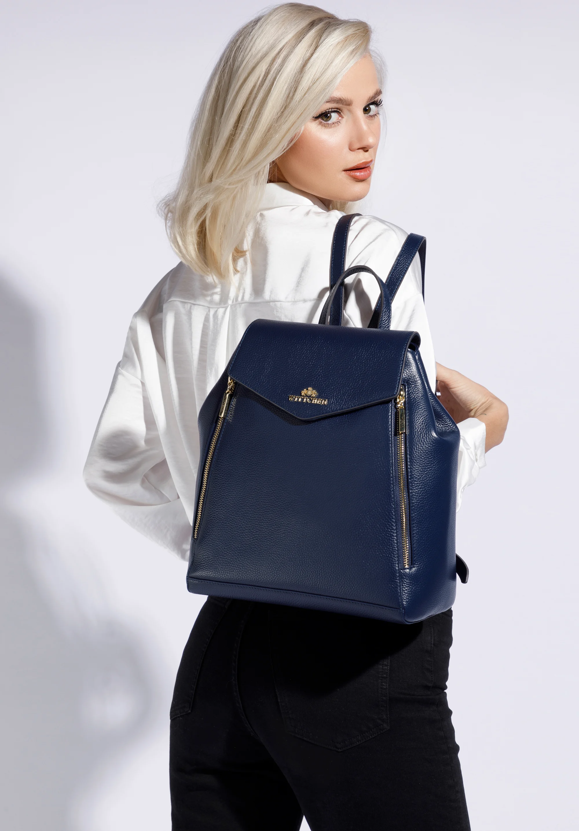 Damski plecak skórzany z pionowymi suwakami