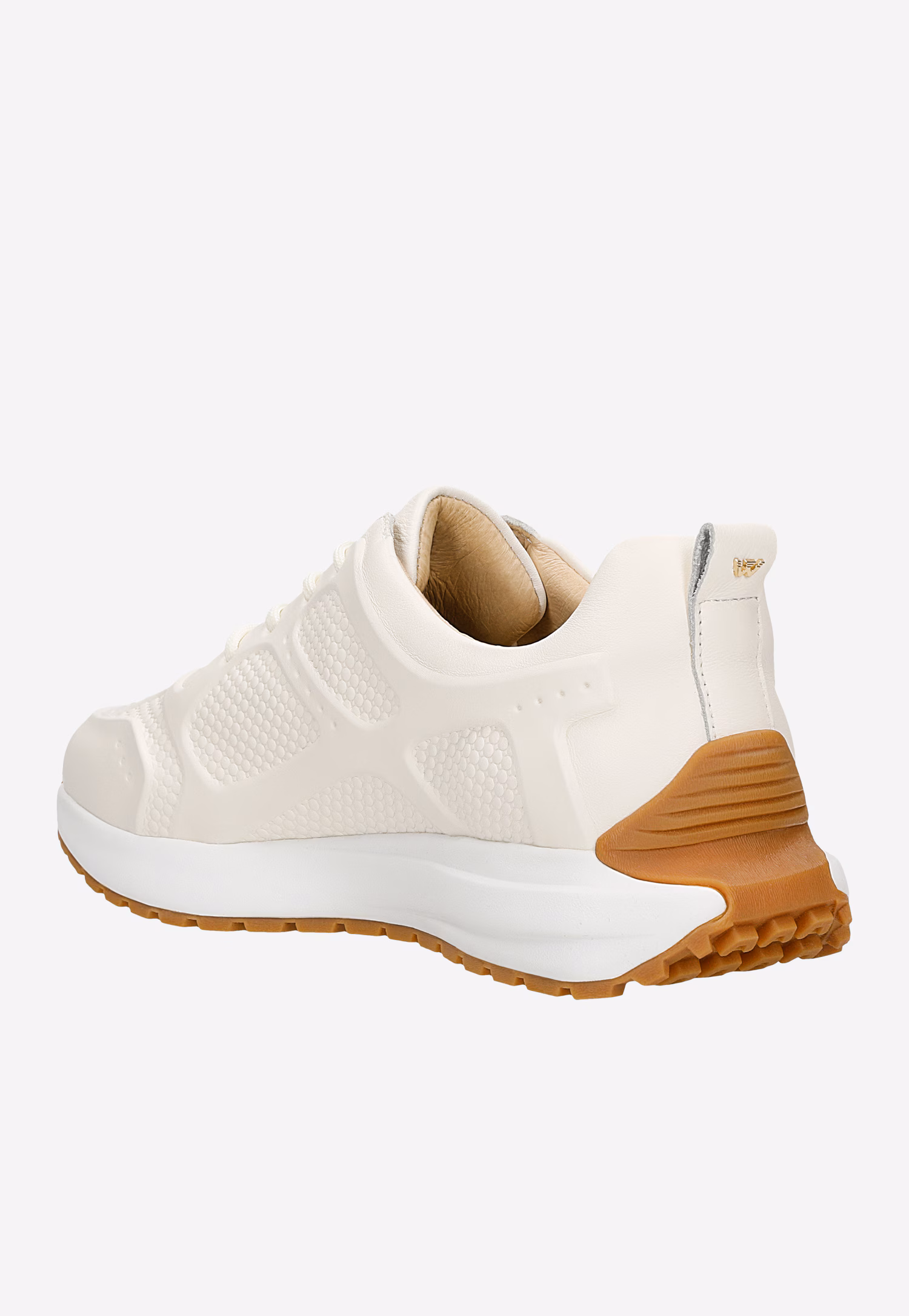 Beżowe sneakersy damskie z ozdobnymi tłoczeniami