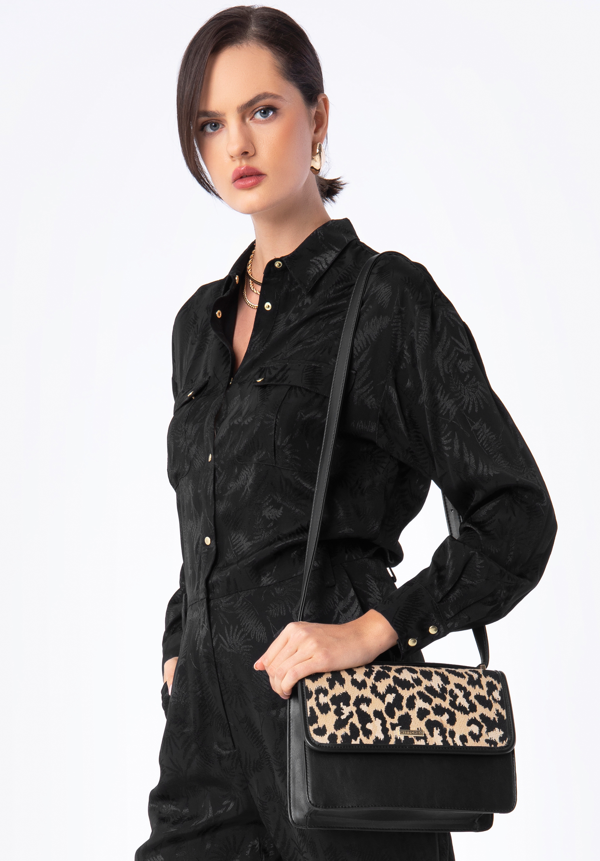 Damska listonoszka z ekoskóry z wzorzystą klapą