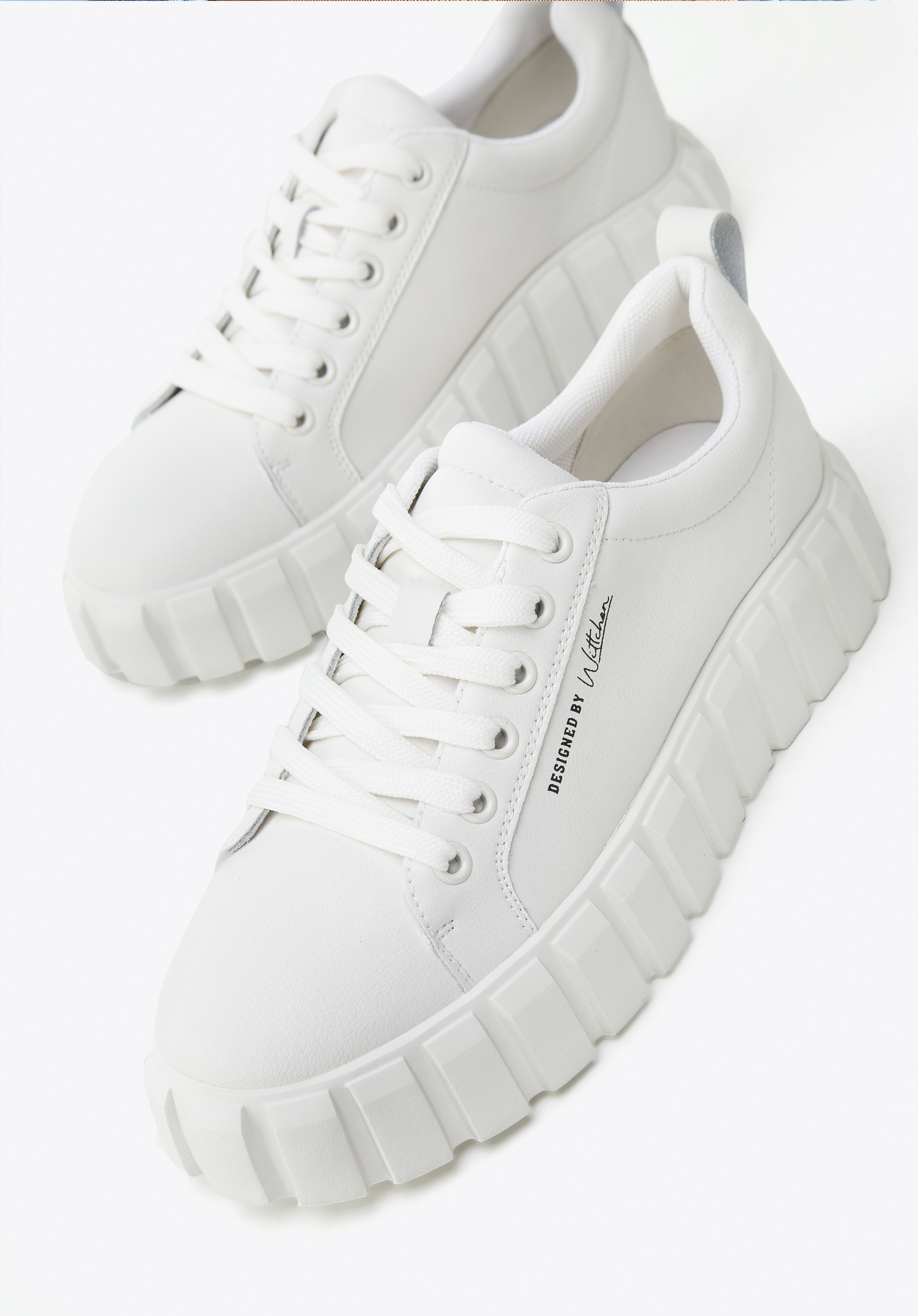 Damskie sneakersy ze skóry na grubej podeszwie