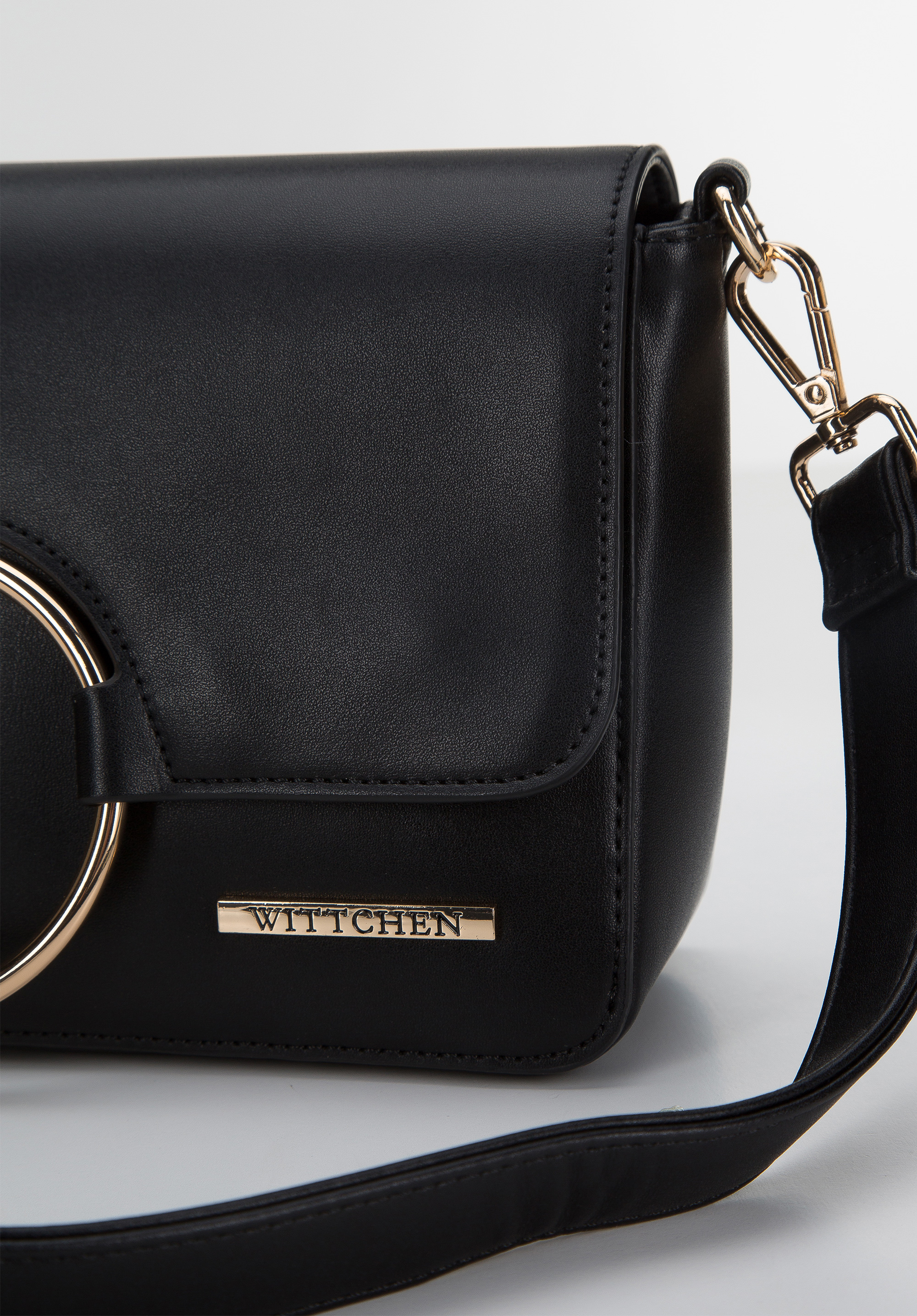 Damska torebka z kółkiem na klapie