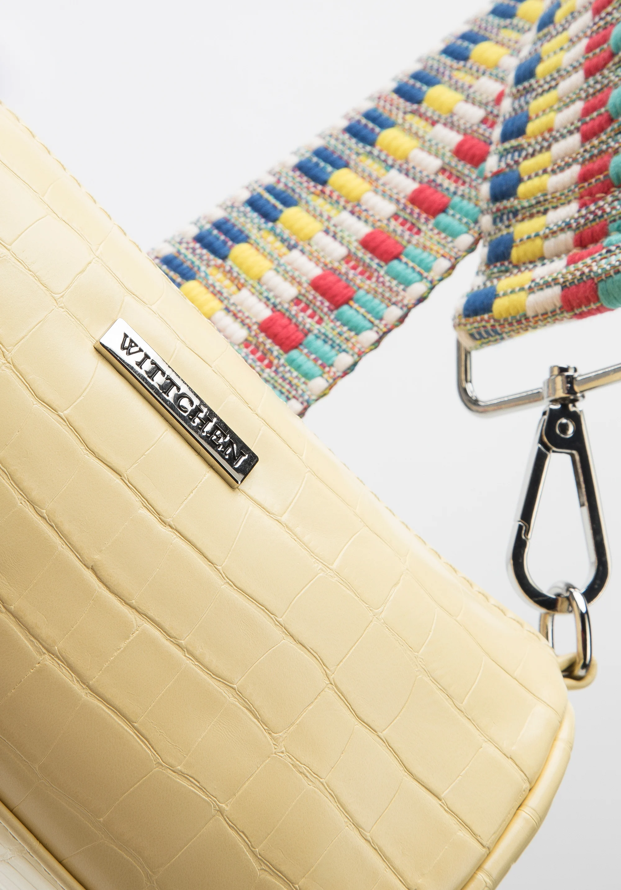 Damska minitorebka z wymiennymi paskami