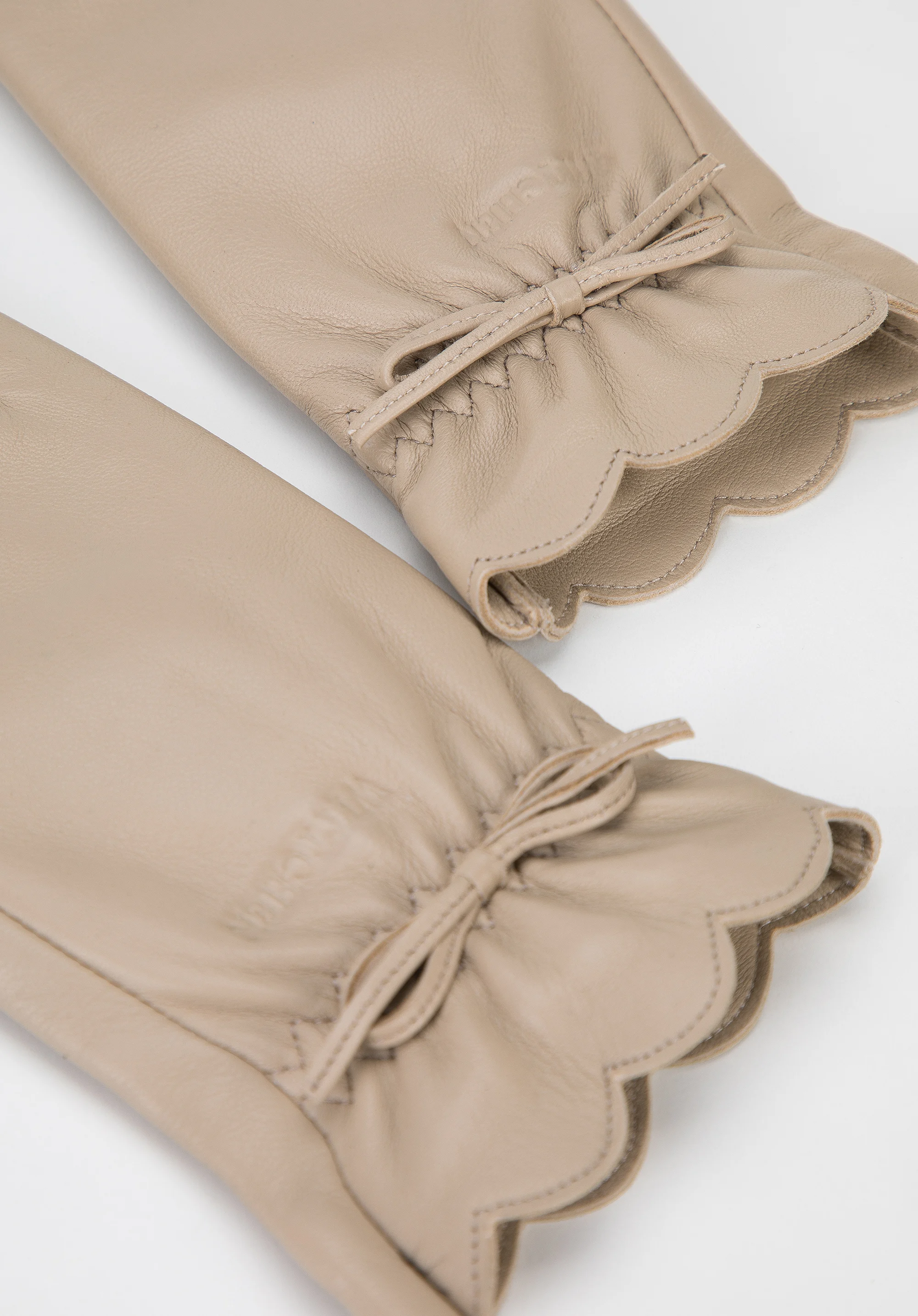 Damskie rękawiczki skórzane z falbanką i kokardką