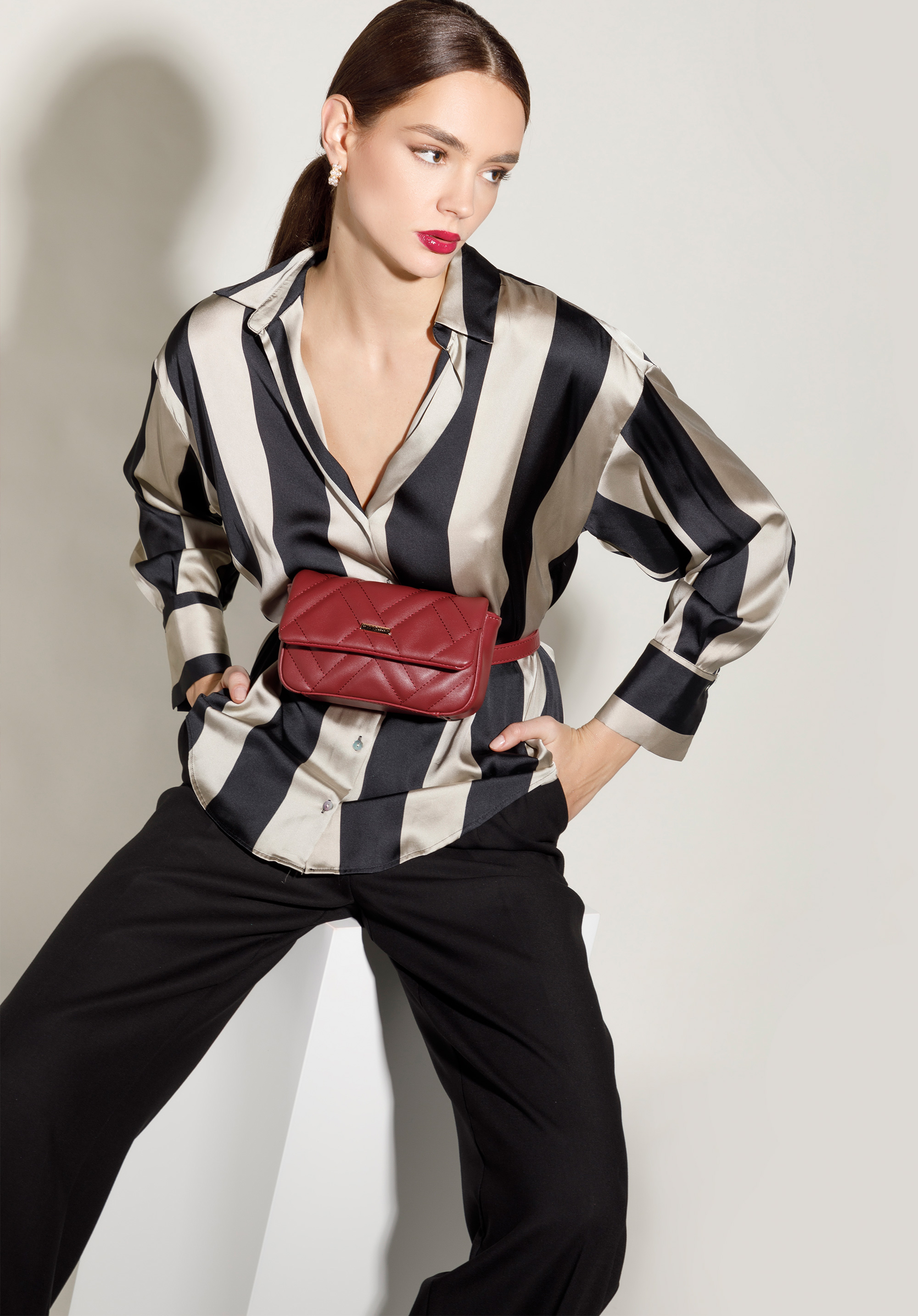 Damska torebka nerka geometrycznie pikowana