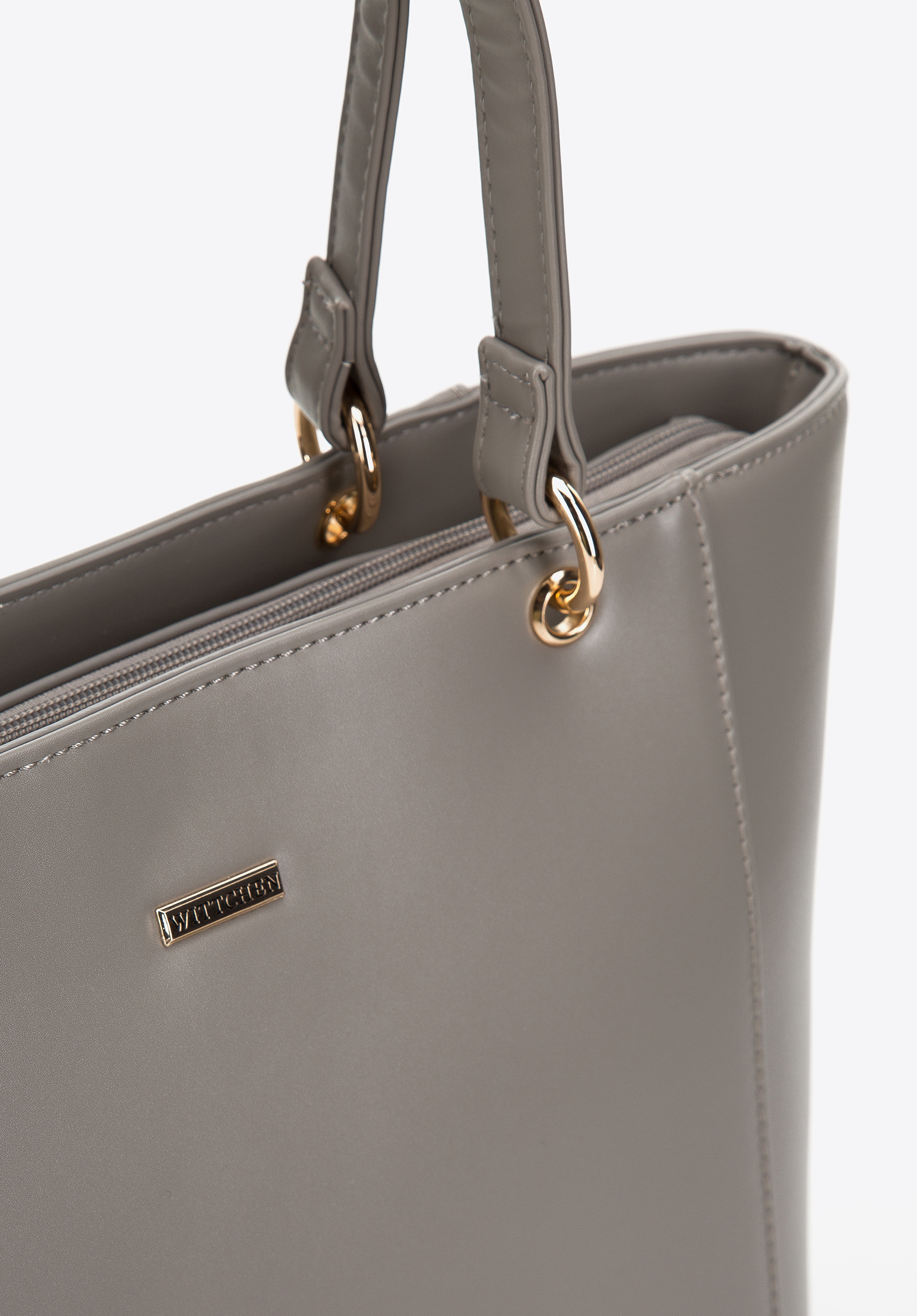 Torebka shopperka z ekoskóry z ozdobnymi kółkami