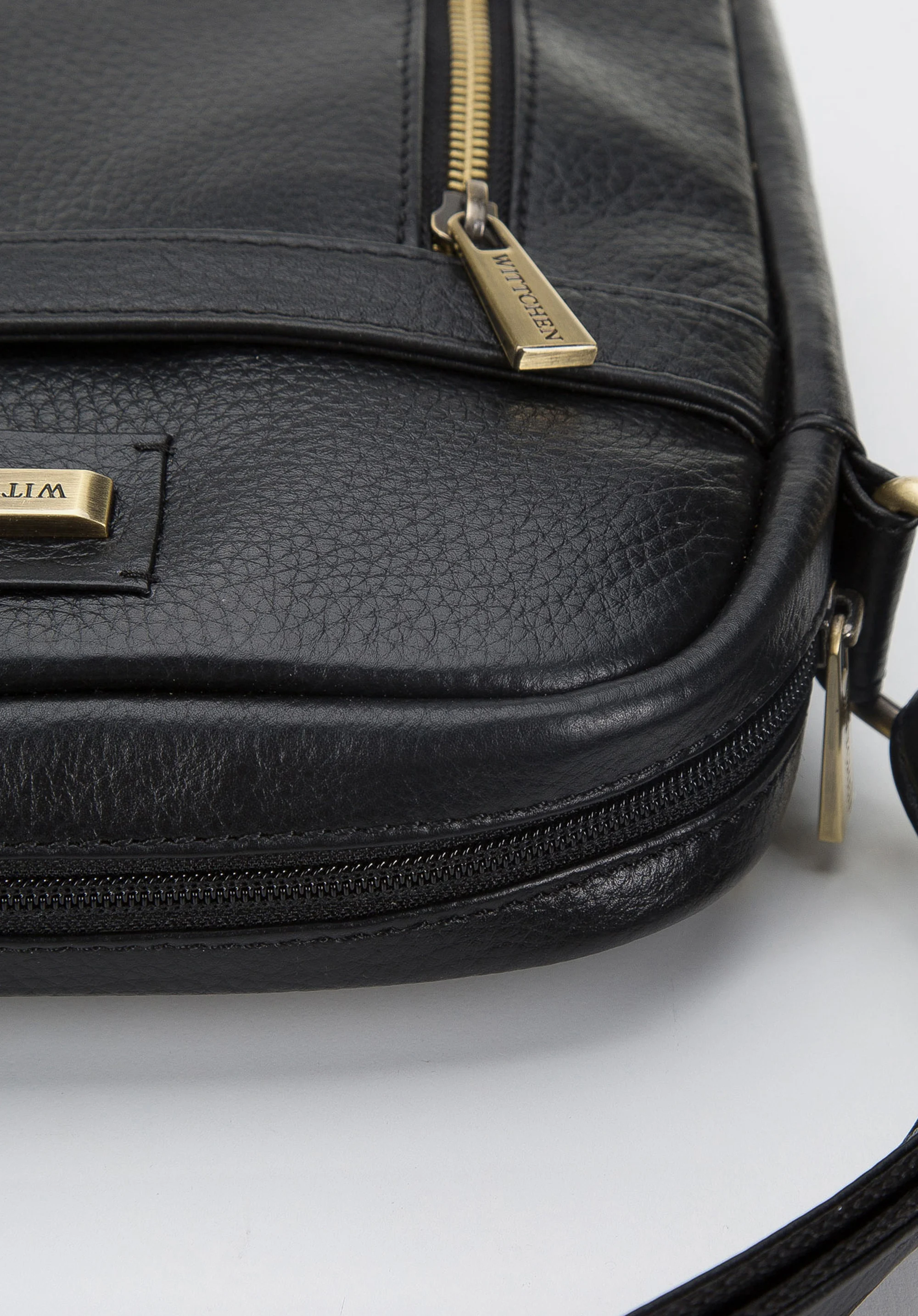 Męska listonoszka skórzana z pionowym suwakiem