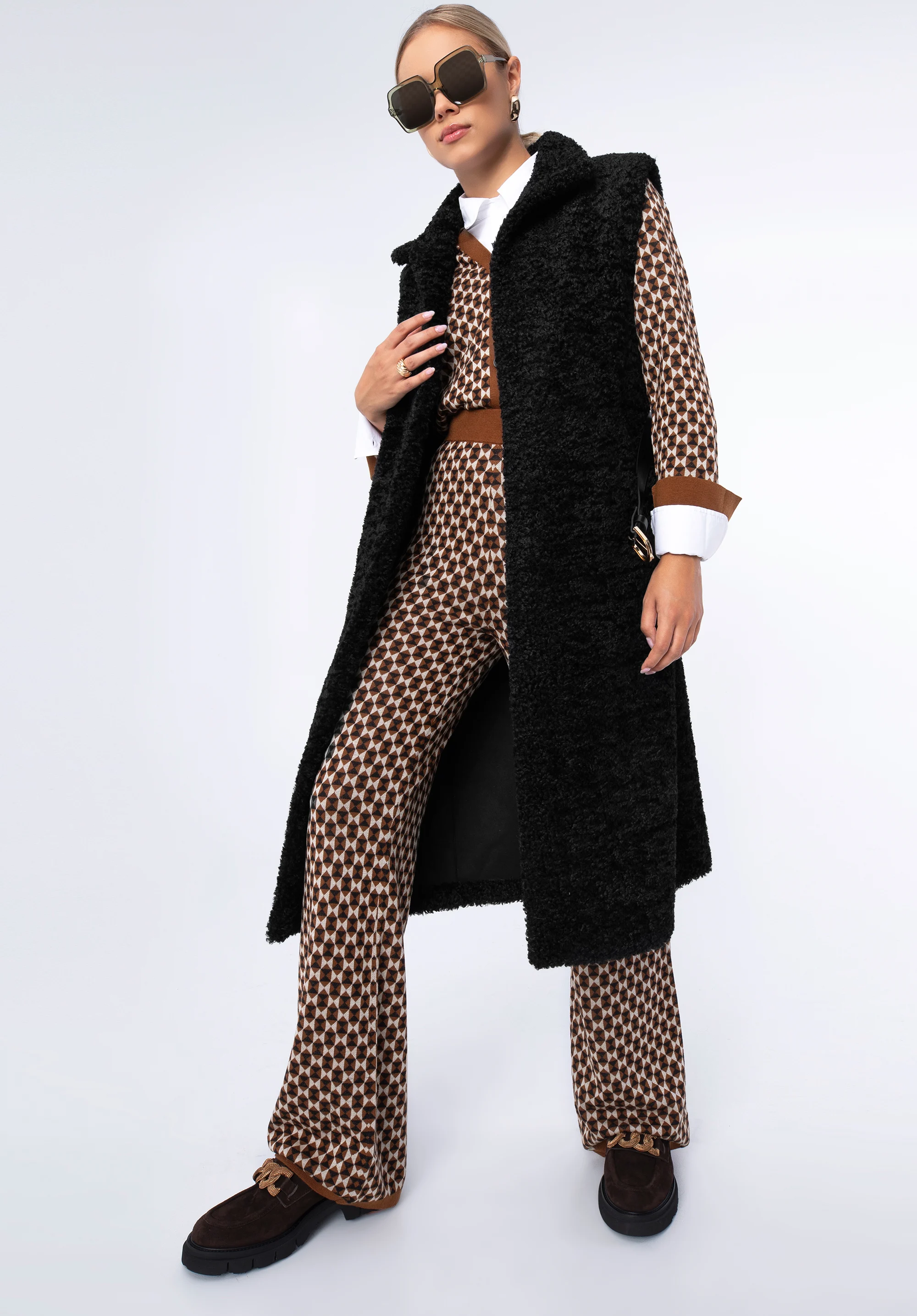 Damska kamizelka ze sztucznego baranka długa