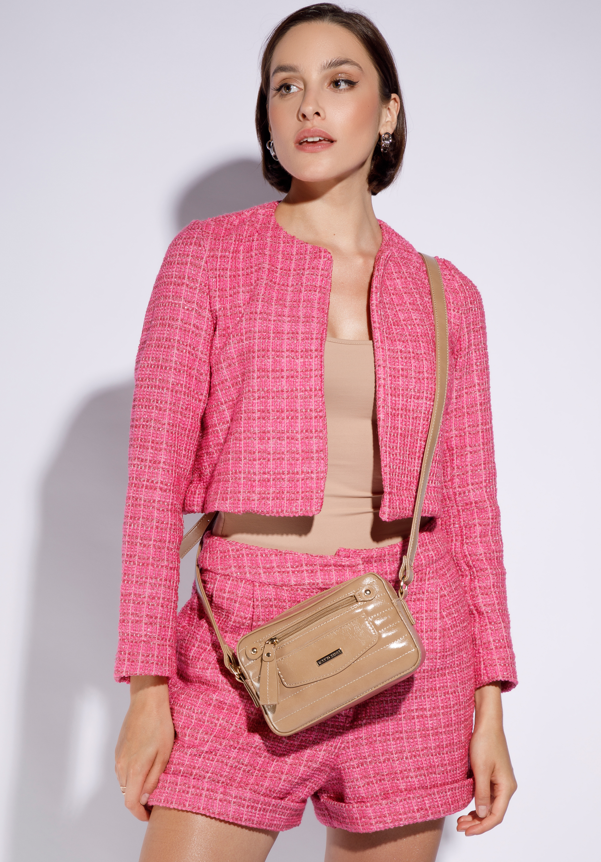 Damska listonoszka z błyszczącej ekoskóry pikowana