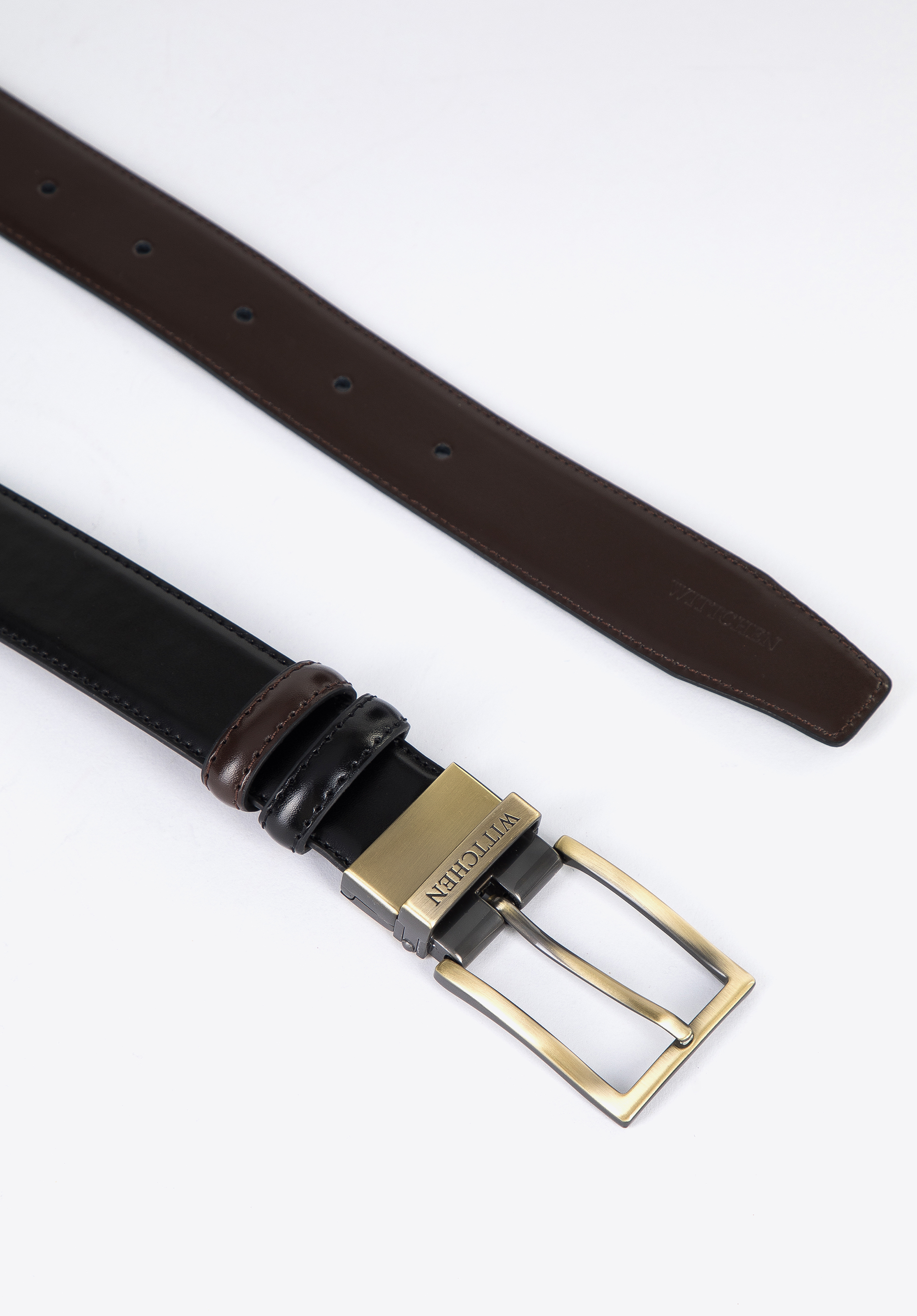 Męski pasek skórzany dwustronny ze stębnowaniem