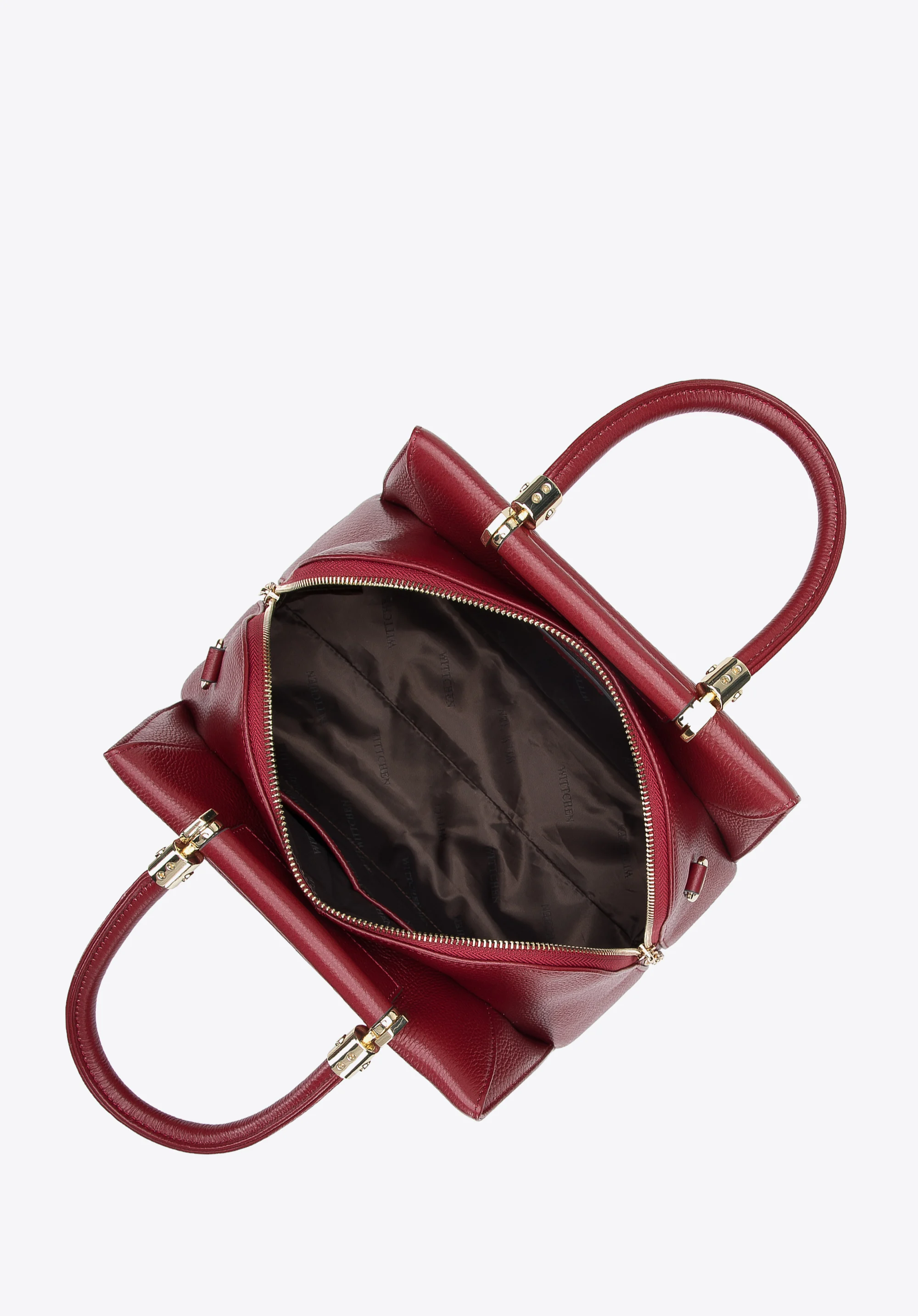 Torebka kuferek skórzana z geometrycznymi okuciami