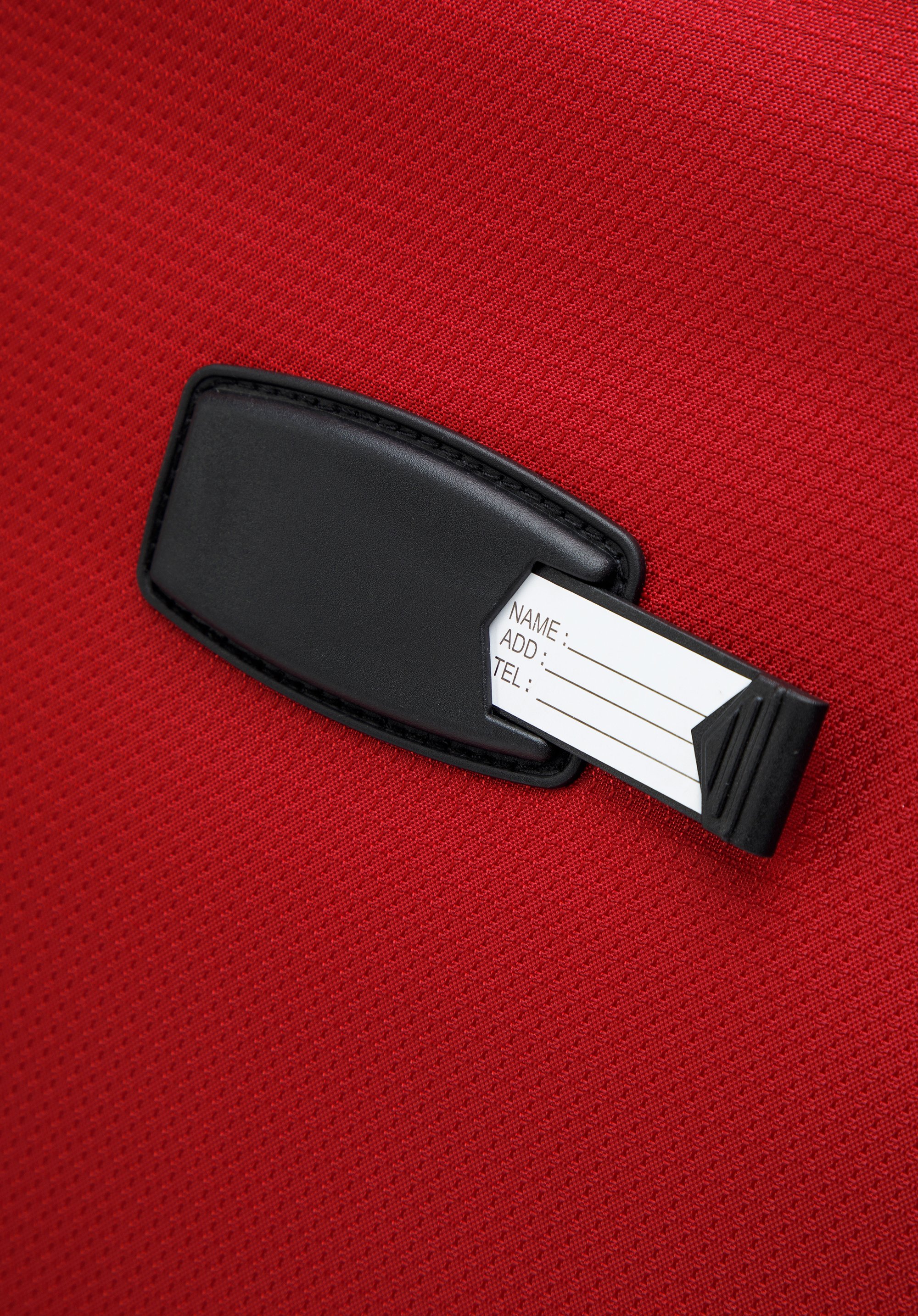 Średnia walizka miękka z błyszczącym suwakiem z przodu