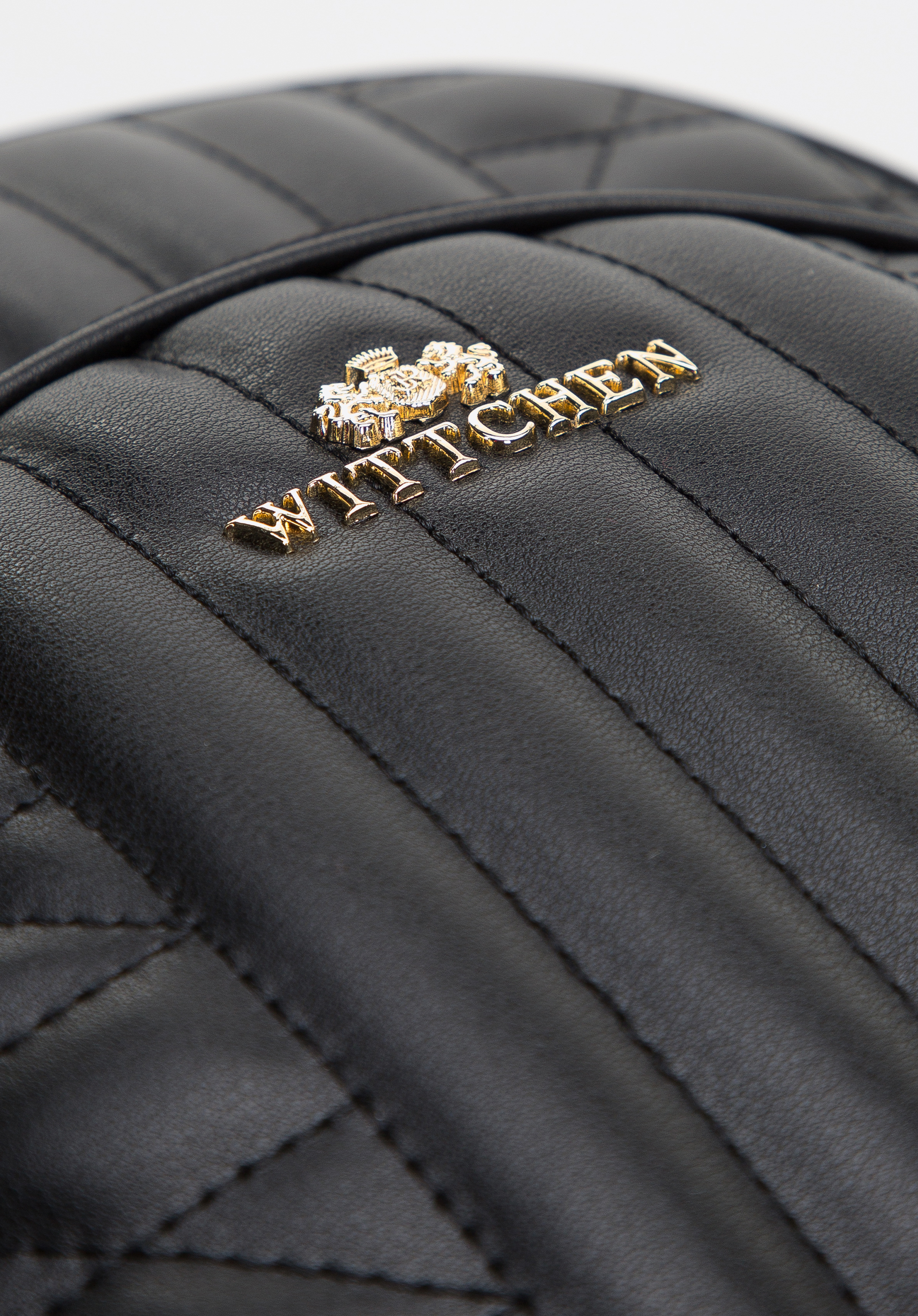 Damski plecak z pikowanej skóry z kieszenią z przodu