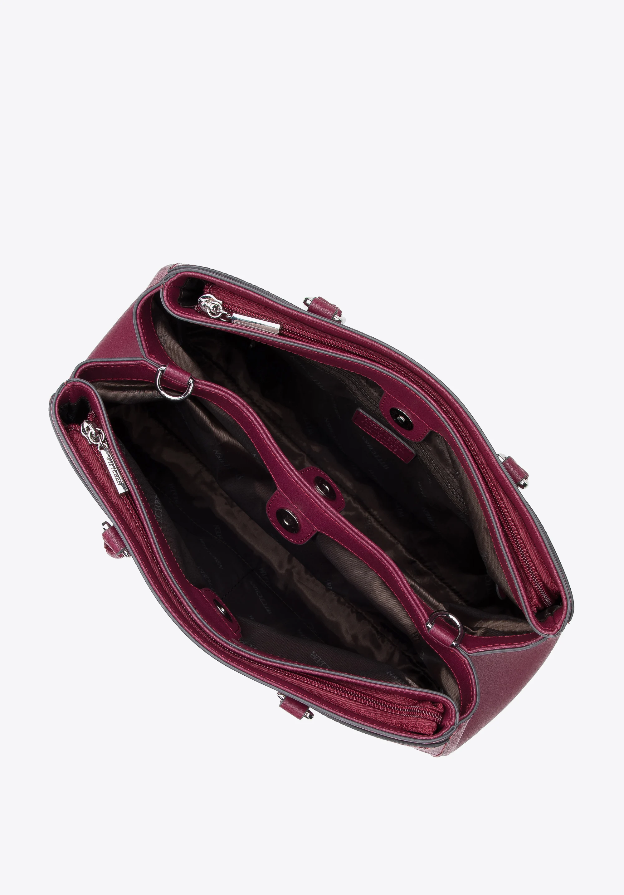 Torebka kuferek ze skóry tłoczonej w monogram