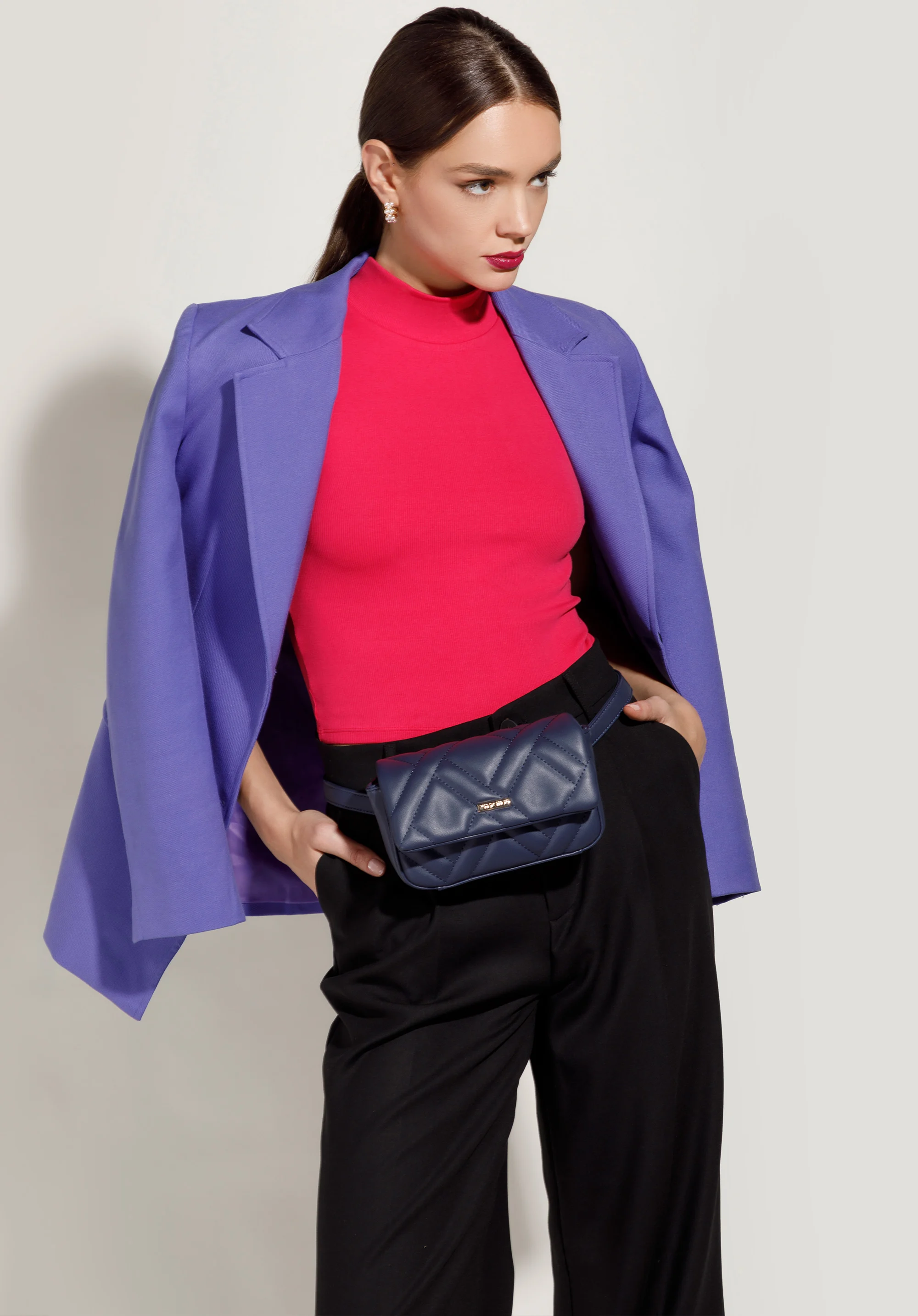 Damska torebka nerka geometrycznie pikowana