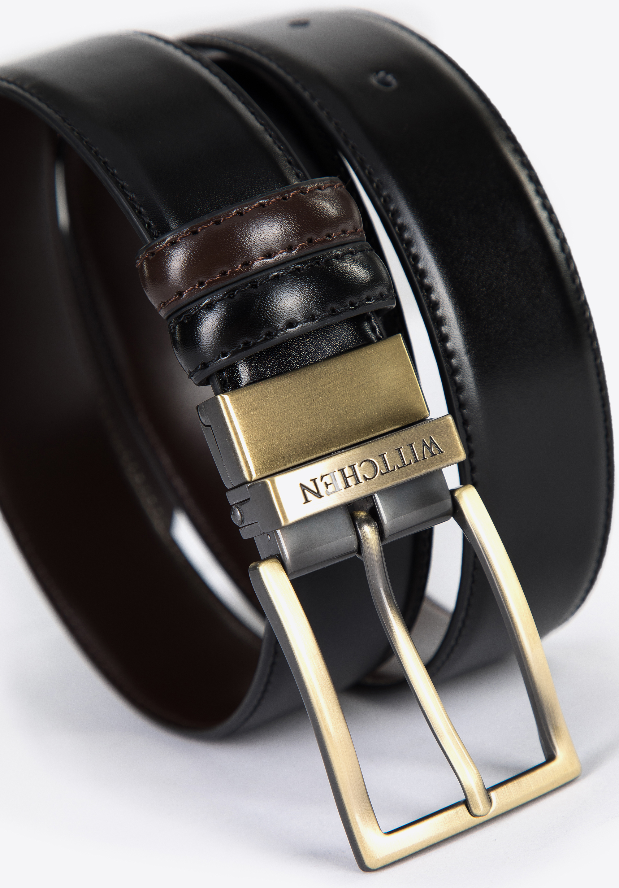 Męski pasek skórzany dwustronny ze stębnowaniem