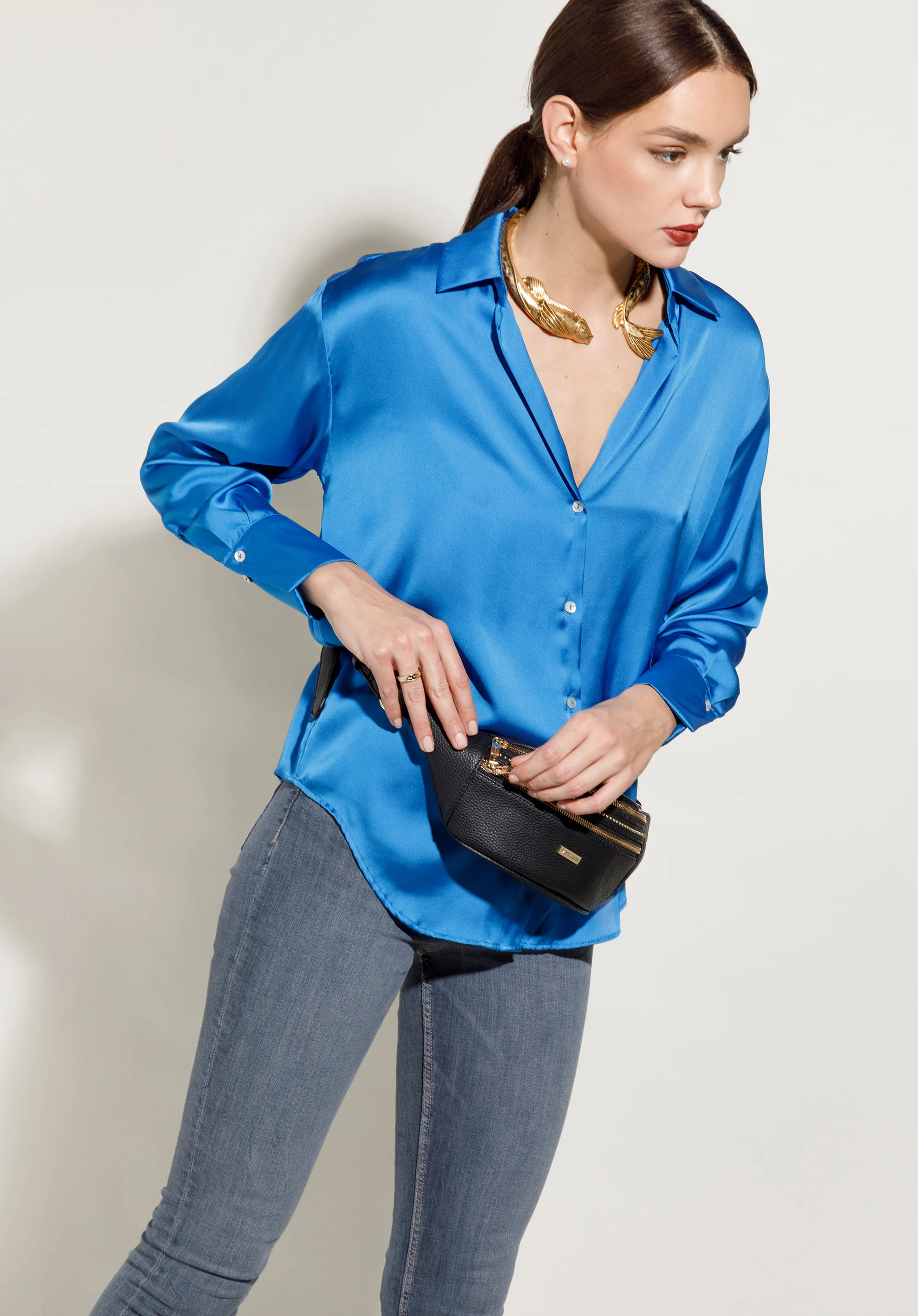 Damska torebka nerka z nitami