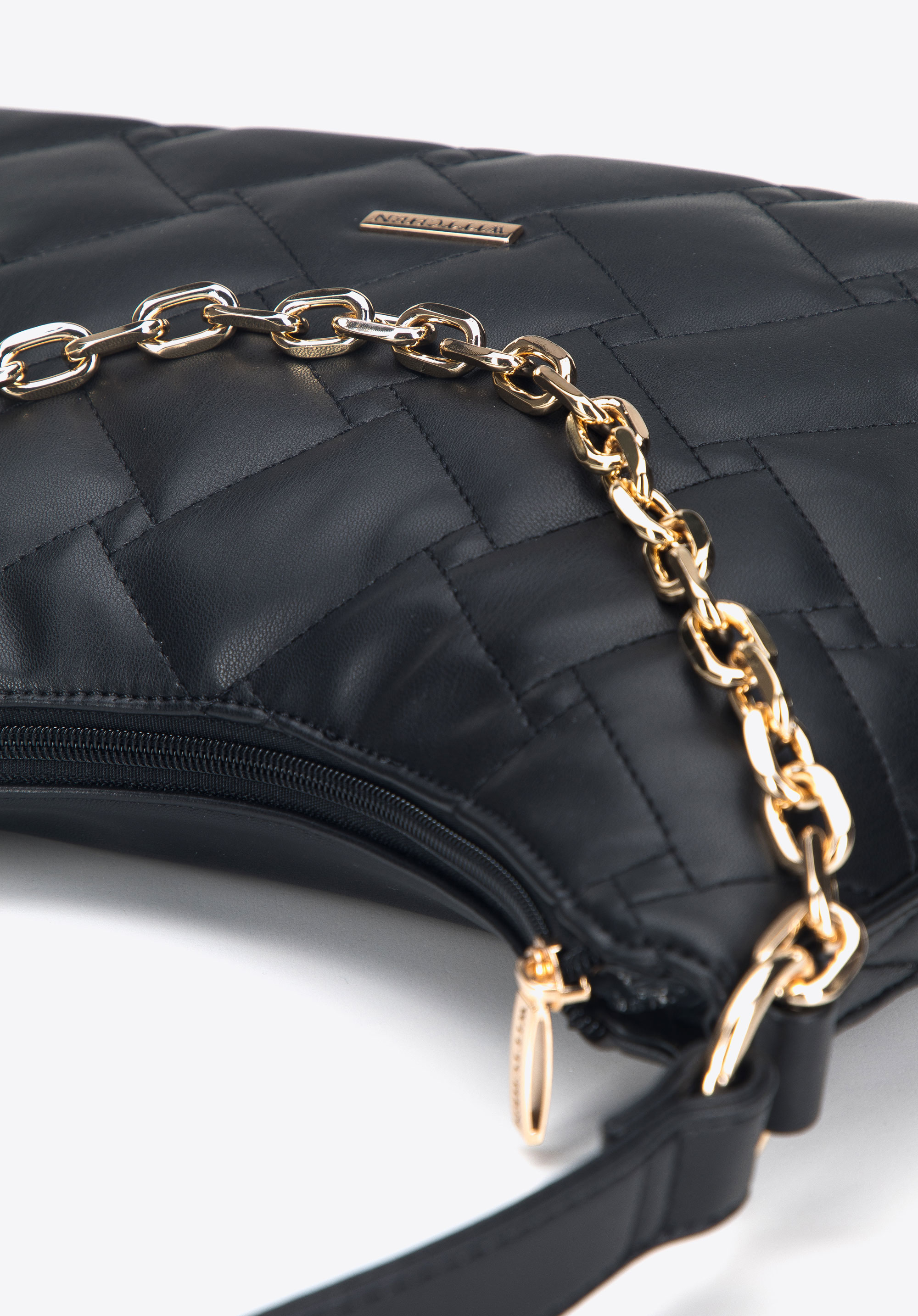 Damska torebka z ekoskóry z pikowaniem w prostokąty i kwadraty