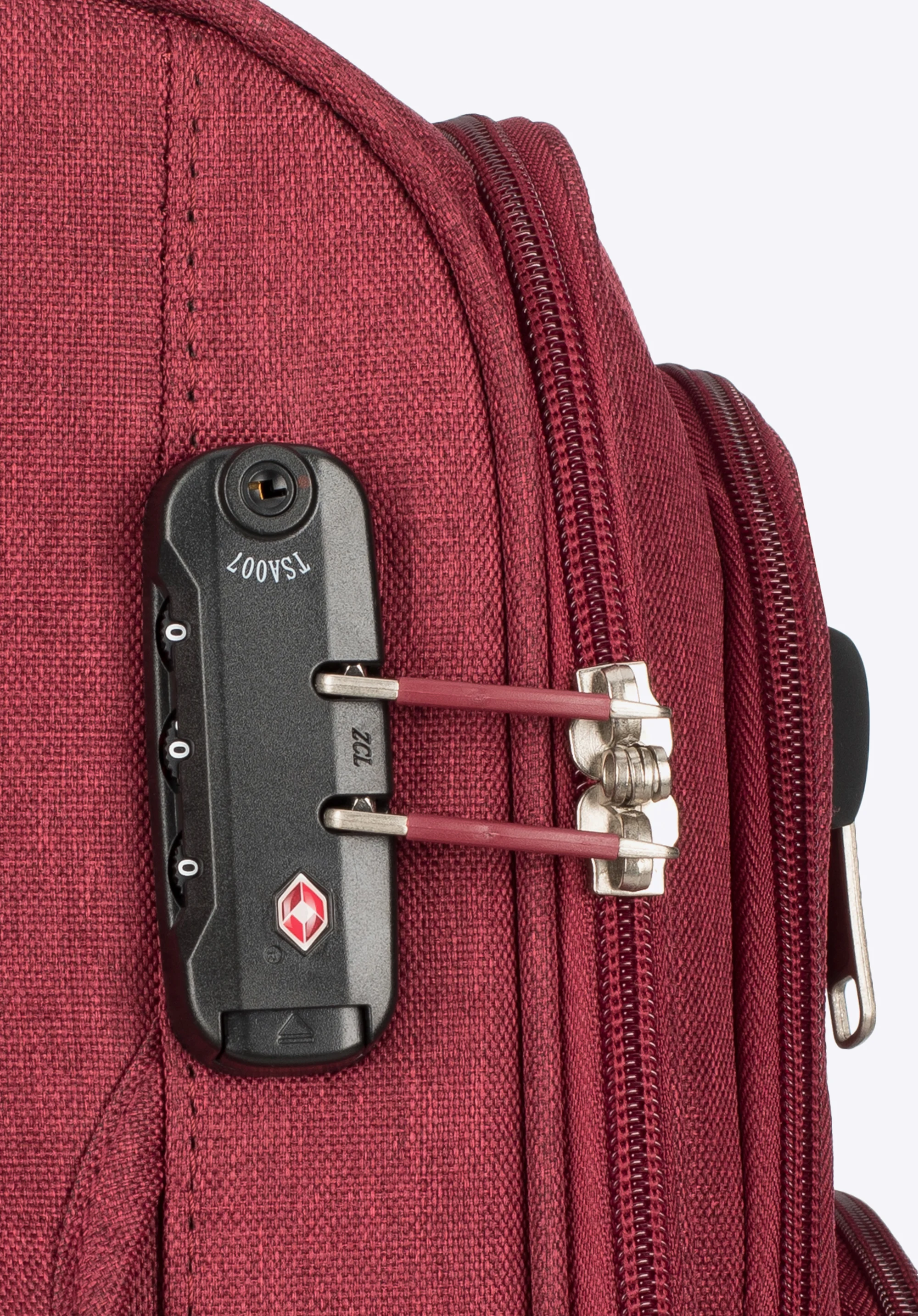 Średnia walizka z kolorowym suwakiem