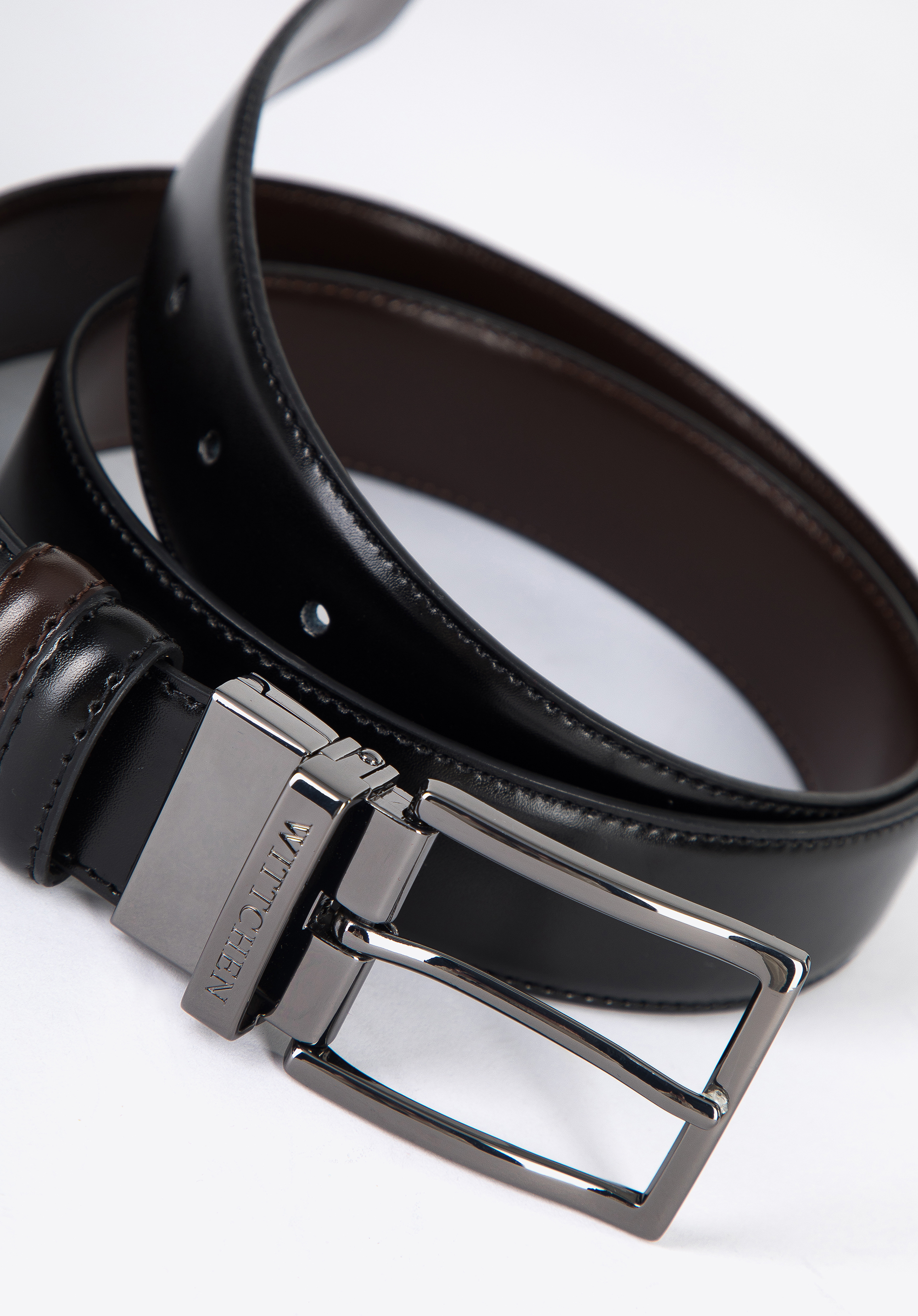 Męski pasek skórzany dwustronny ze stębnowaniem