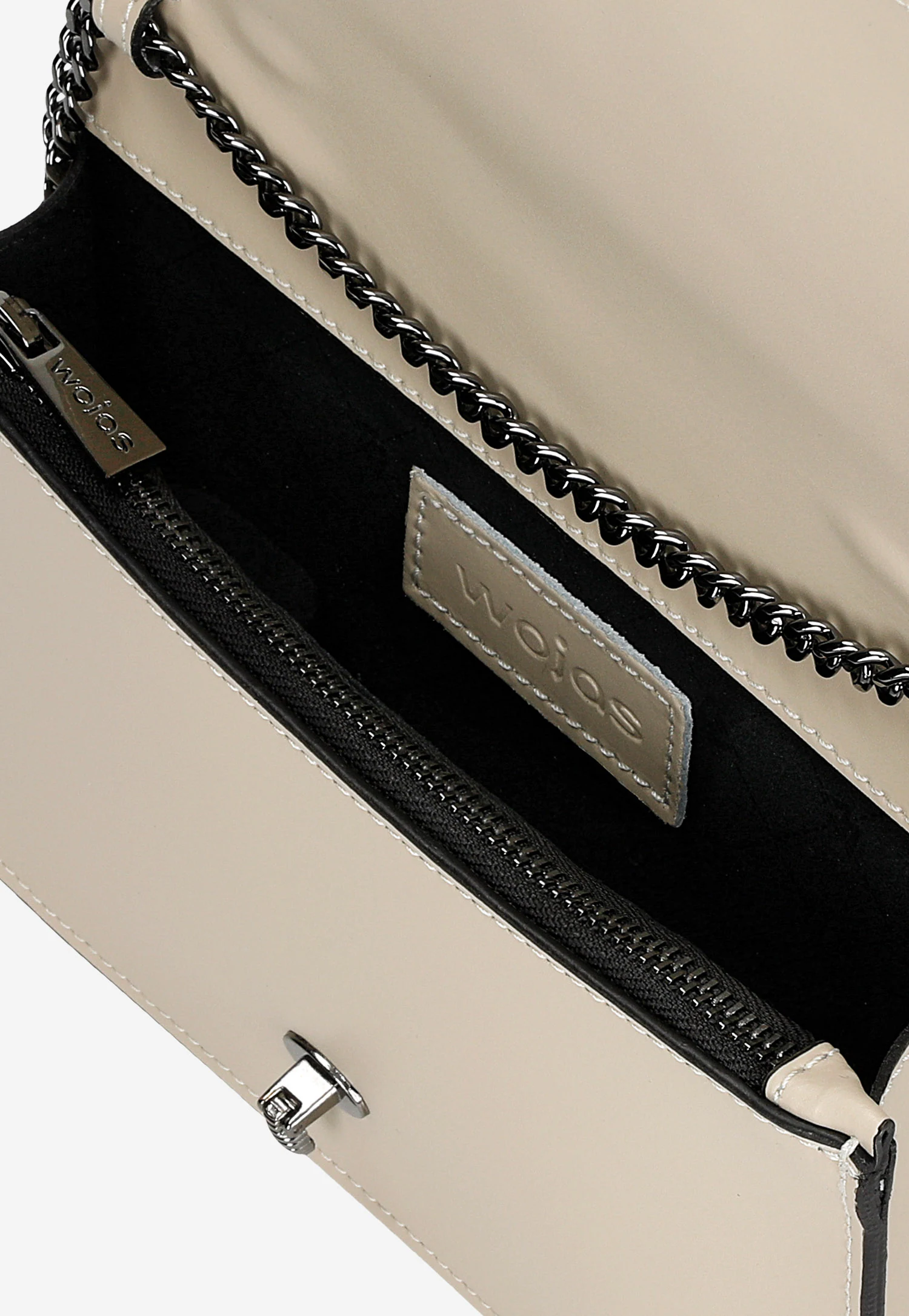 Beżowa skórzana torebka z owadem