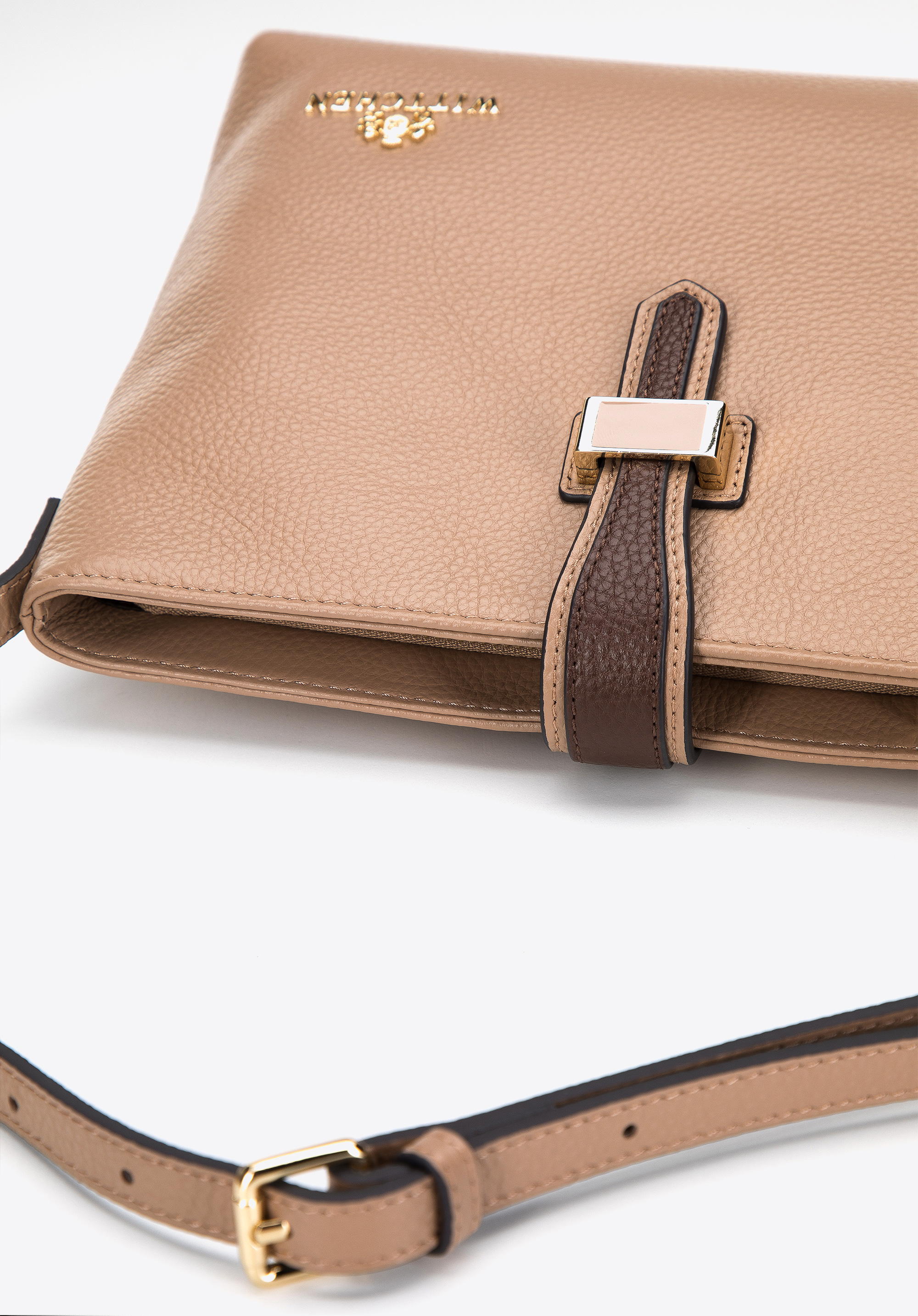 Damska listonoszka ze skóry z kontrastowym zapięciem