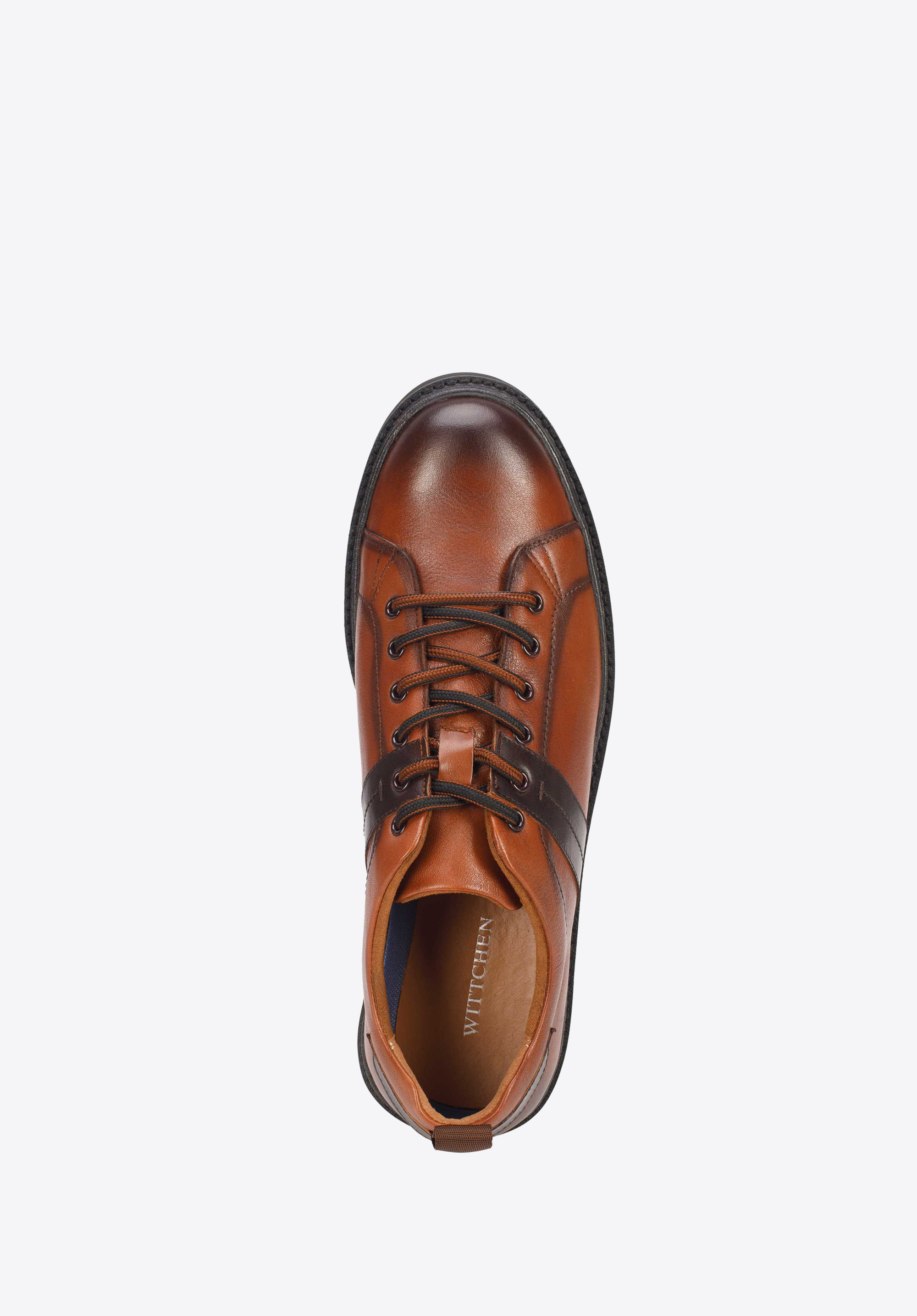 Męskie sneakersy skórzane na ciemnej podeszwie