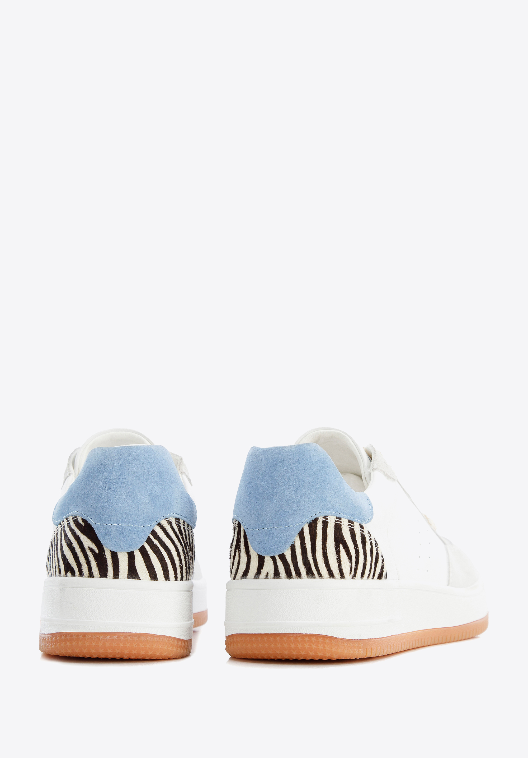 Damskie sneakersy skórzane ze wstawką z motywem zwierzęcym