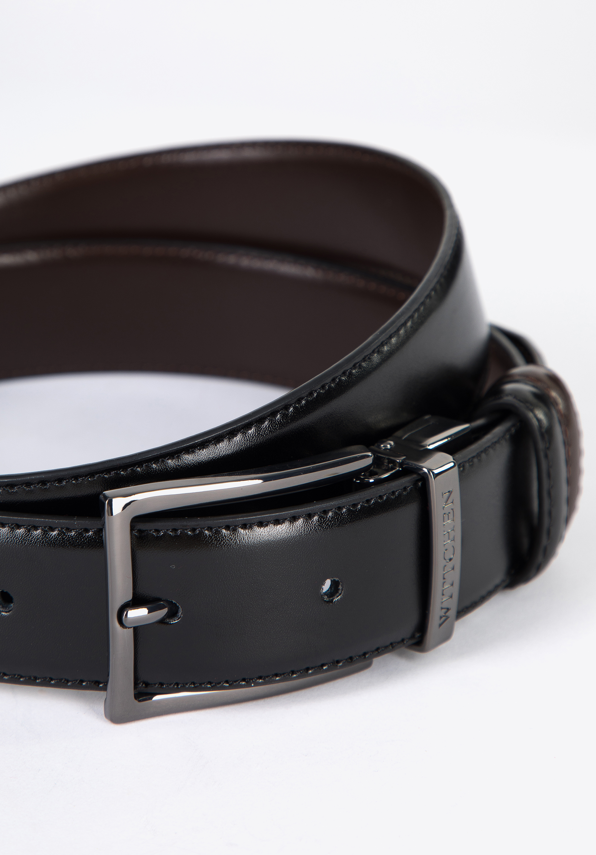 Męski pasek skórzany dwustronny ze stębnowaniem