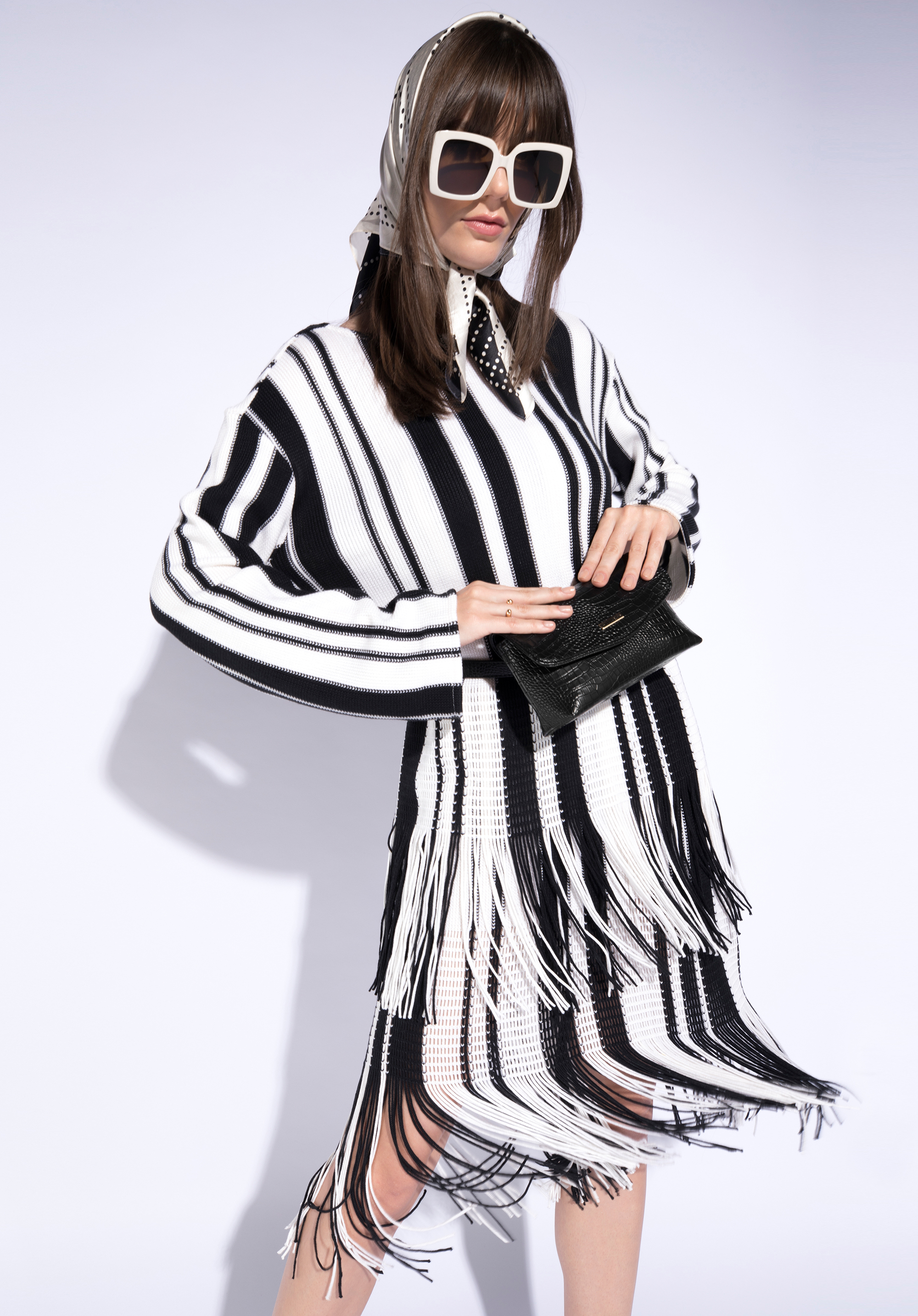 Damska torebka nerka z miękkiej ekoskóry o fakturze croco