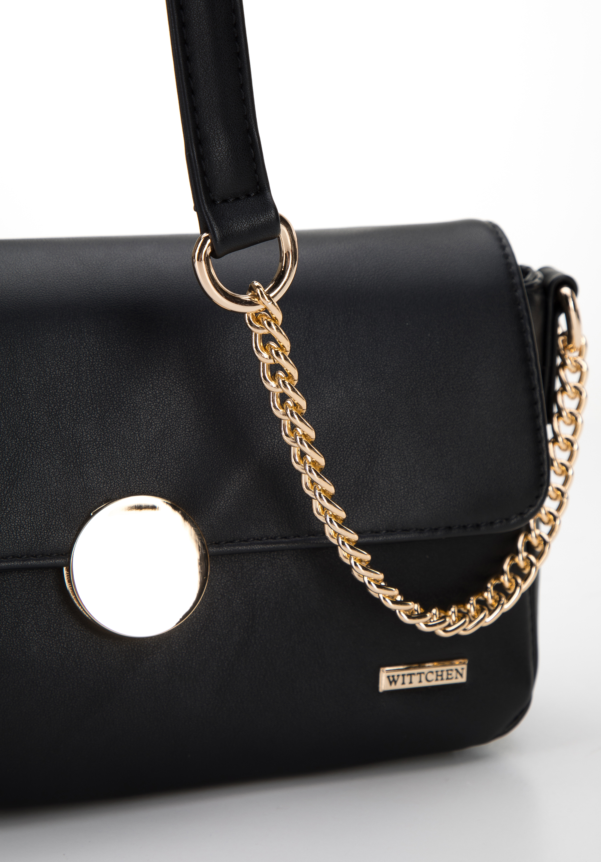 Damska listonoszka z ekoskóry z okrągłą klamrą