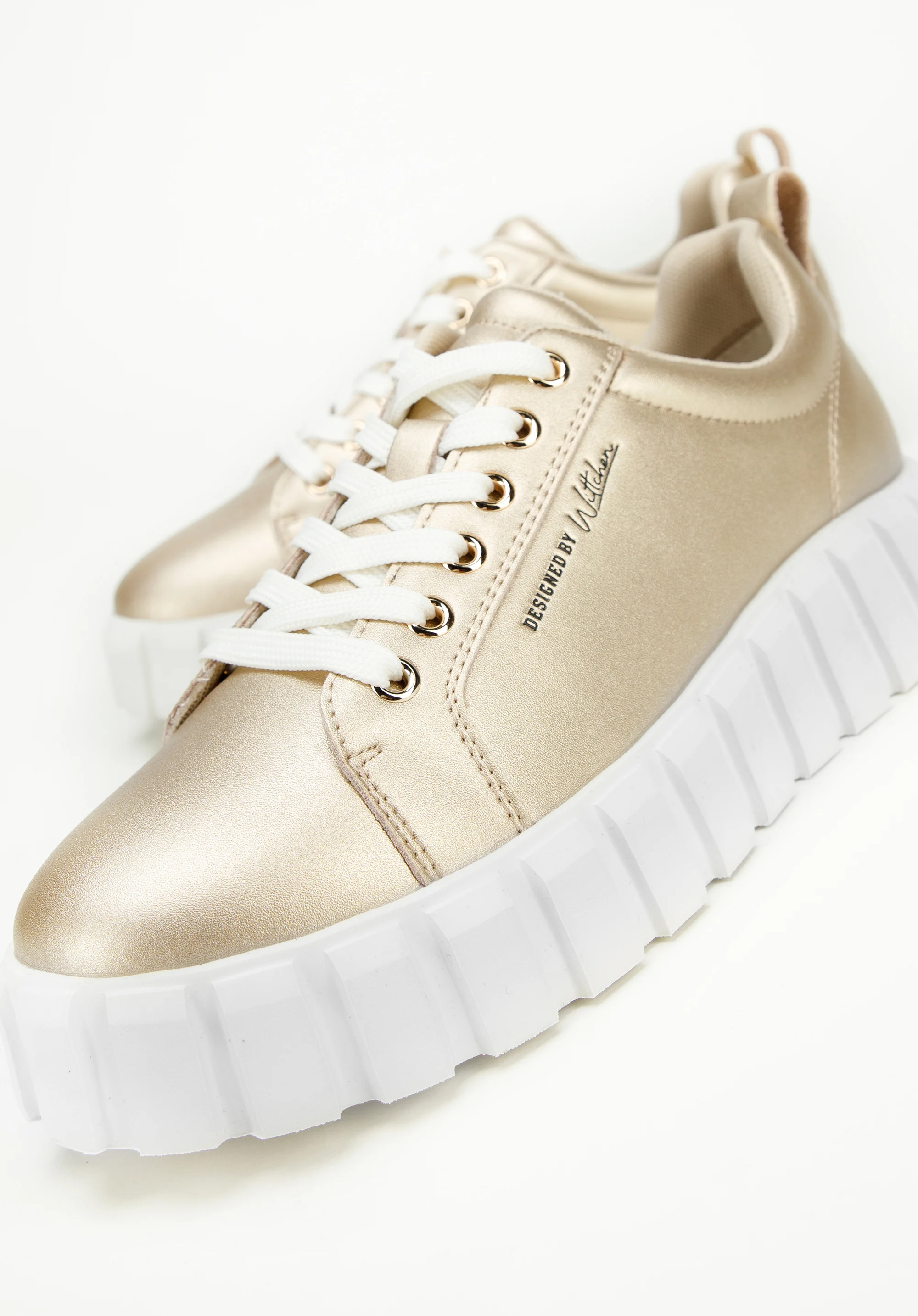 Damskie sneakersy skórzane na grubej platformie