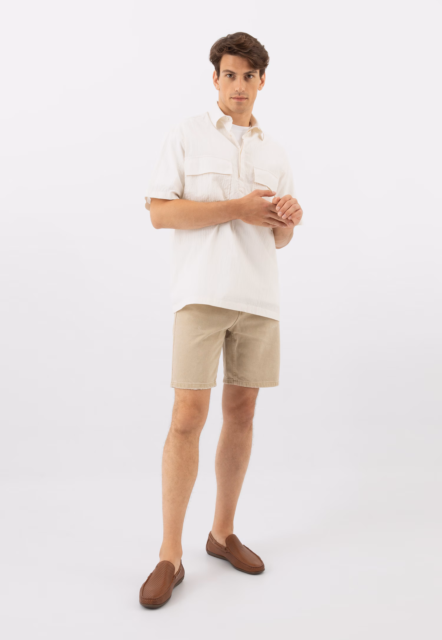 Brązowe ażurowe mokasyny męskie ze skóry licowej