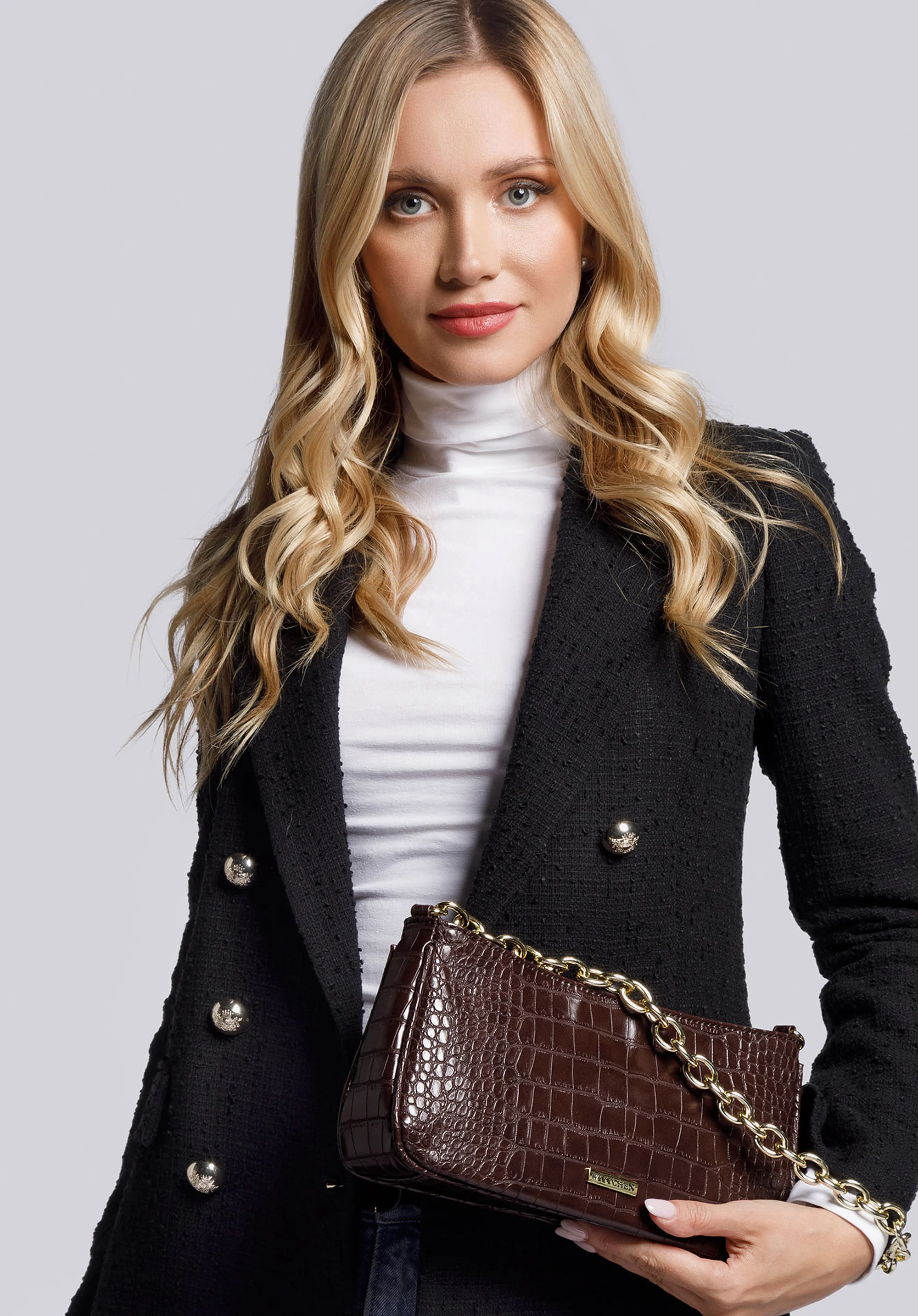 Damska torebka typu baguette na łańcuszku