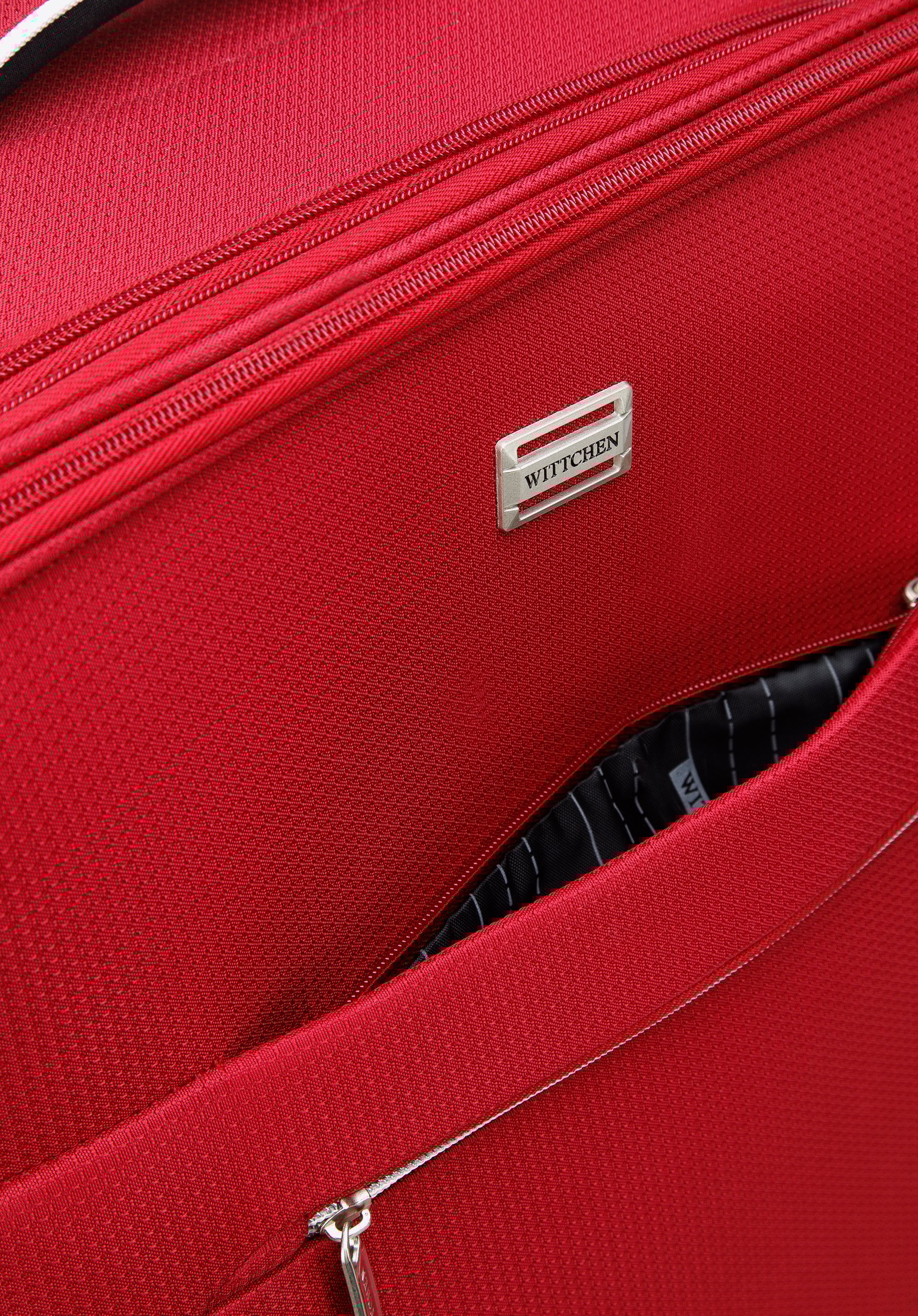 Średnia walizka miękka z błyszczącym suwakiem z przodu