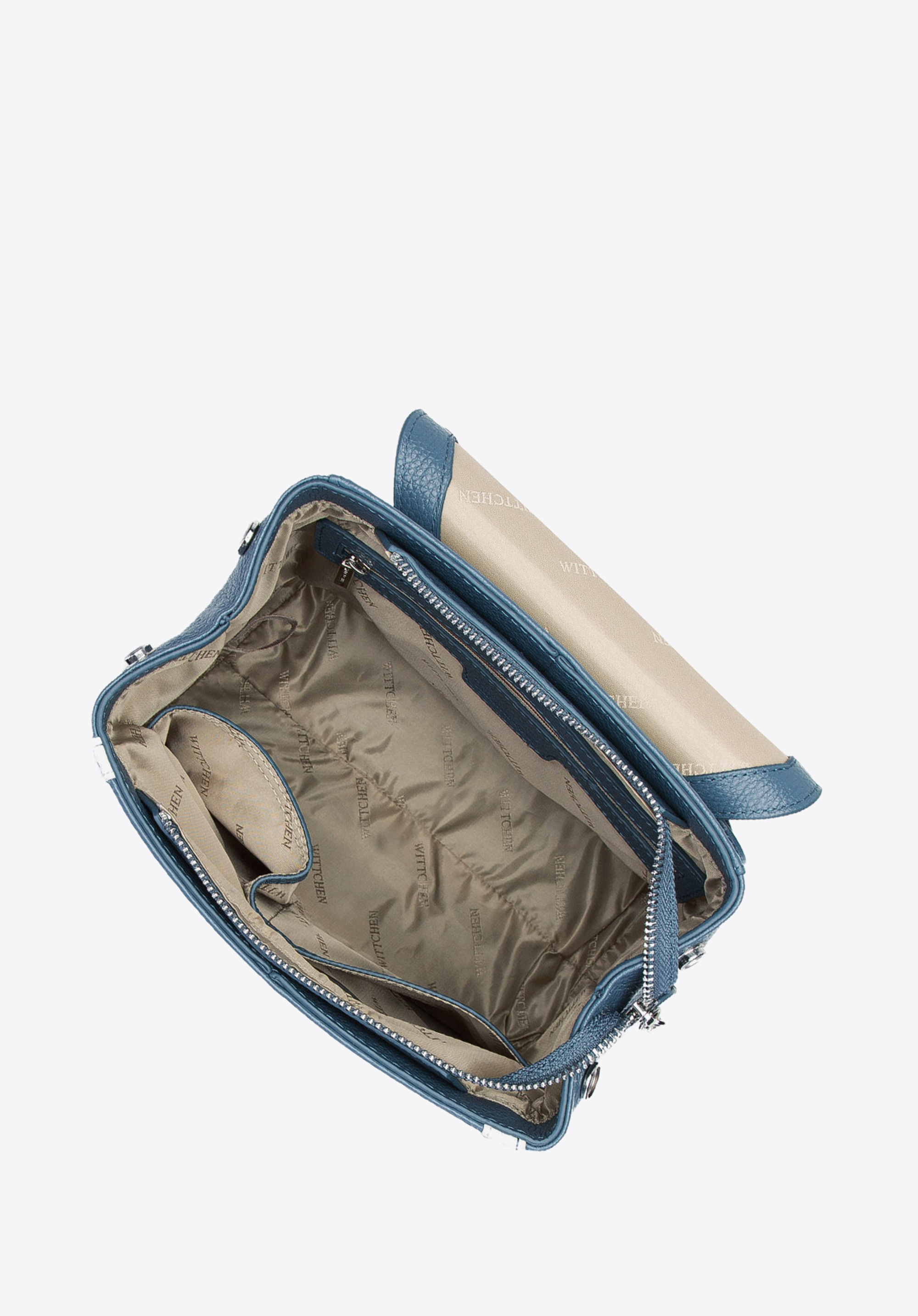 Damski plecak skórzany z kopertową klapą