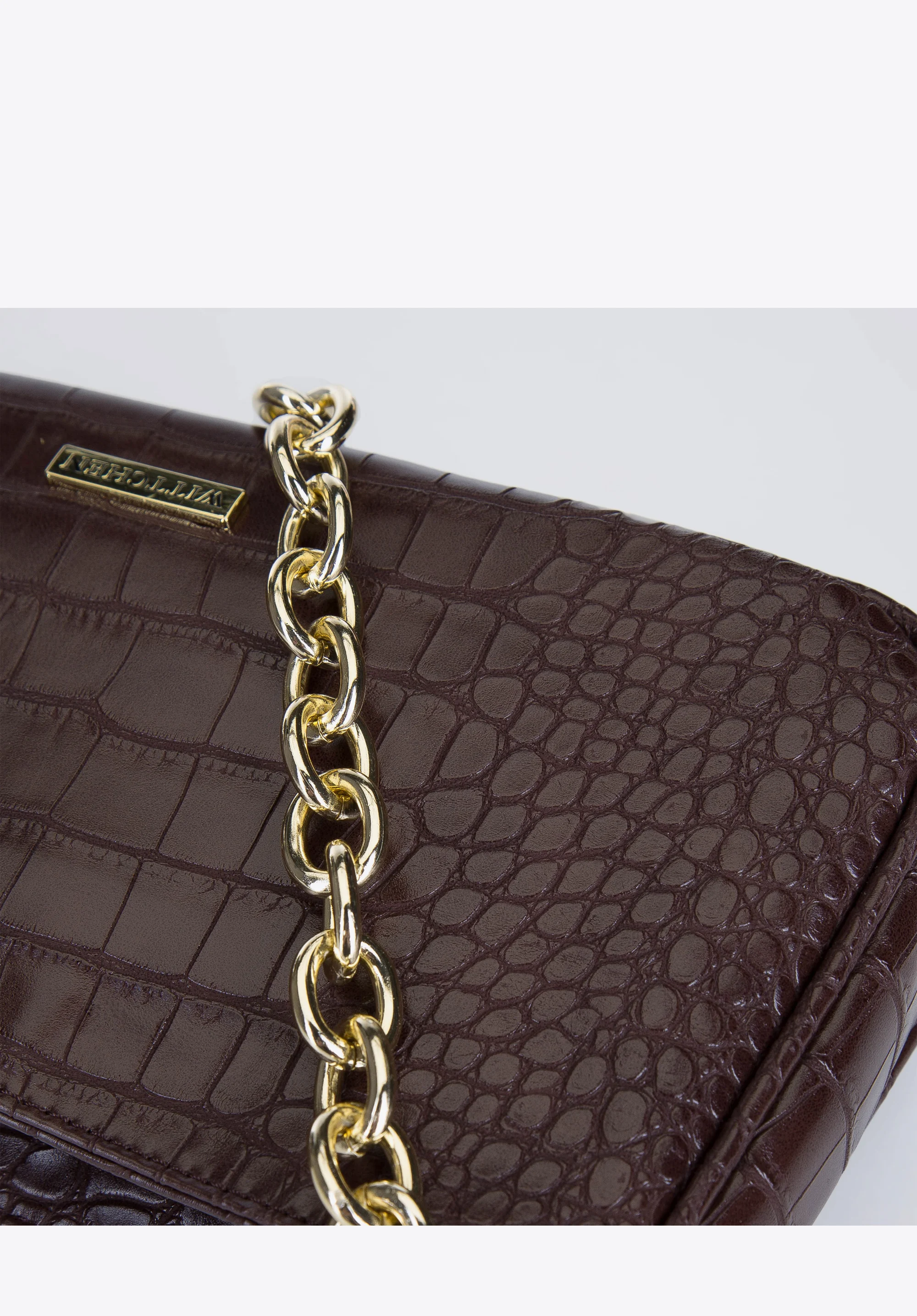 Damska torebka typu baguette na łańcuszku