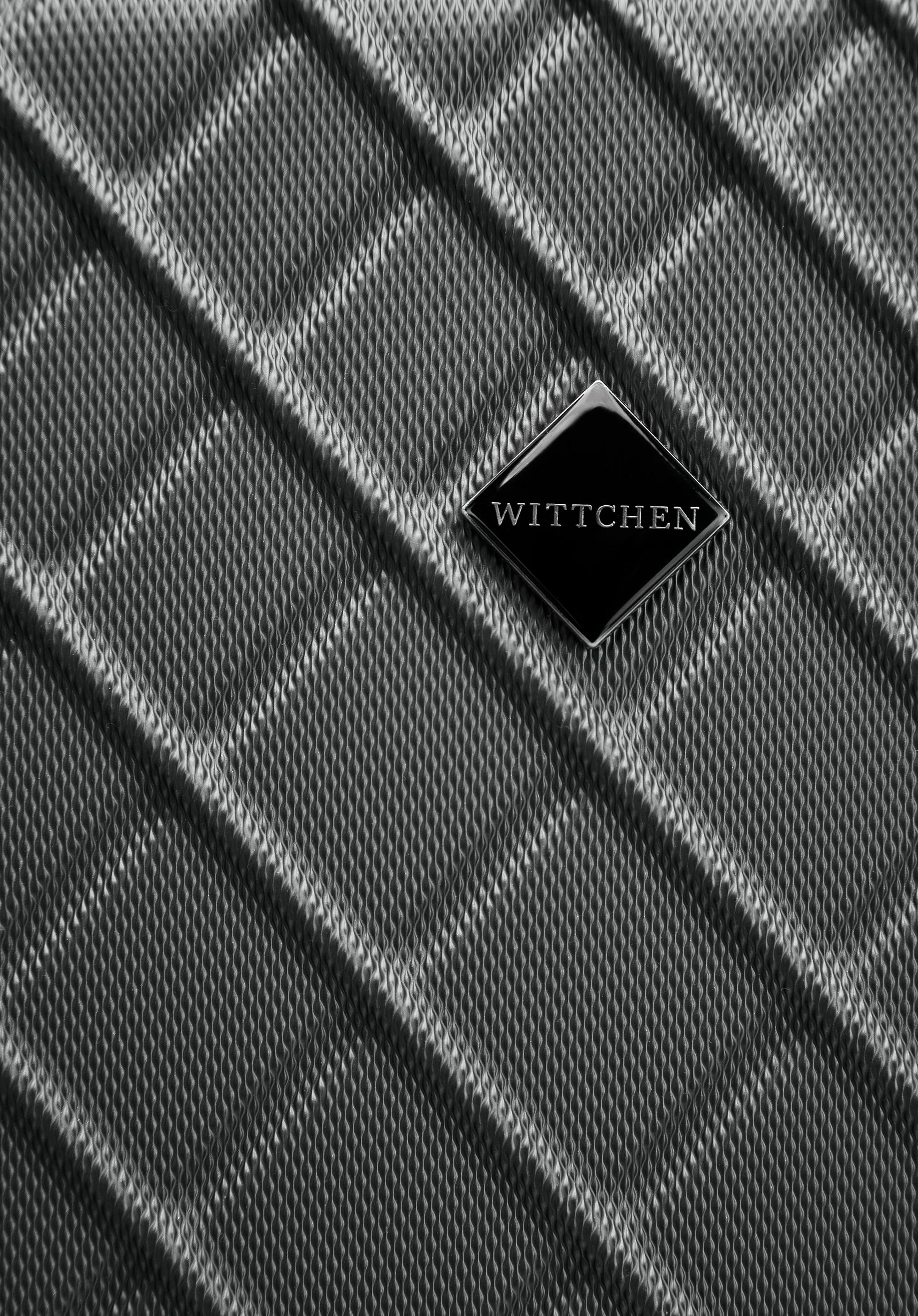 Średnia walizka z ABS-u w ukośną kratkę