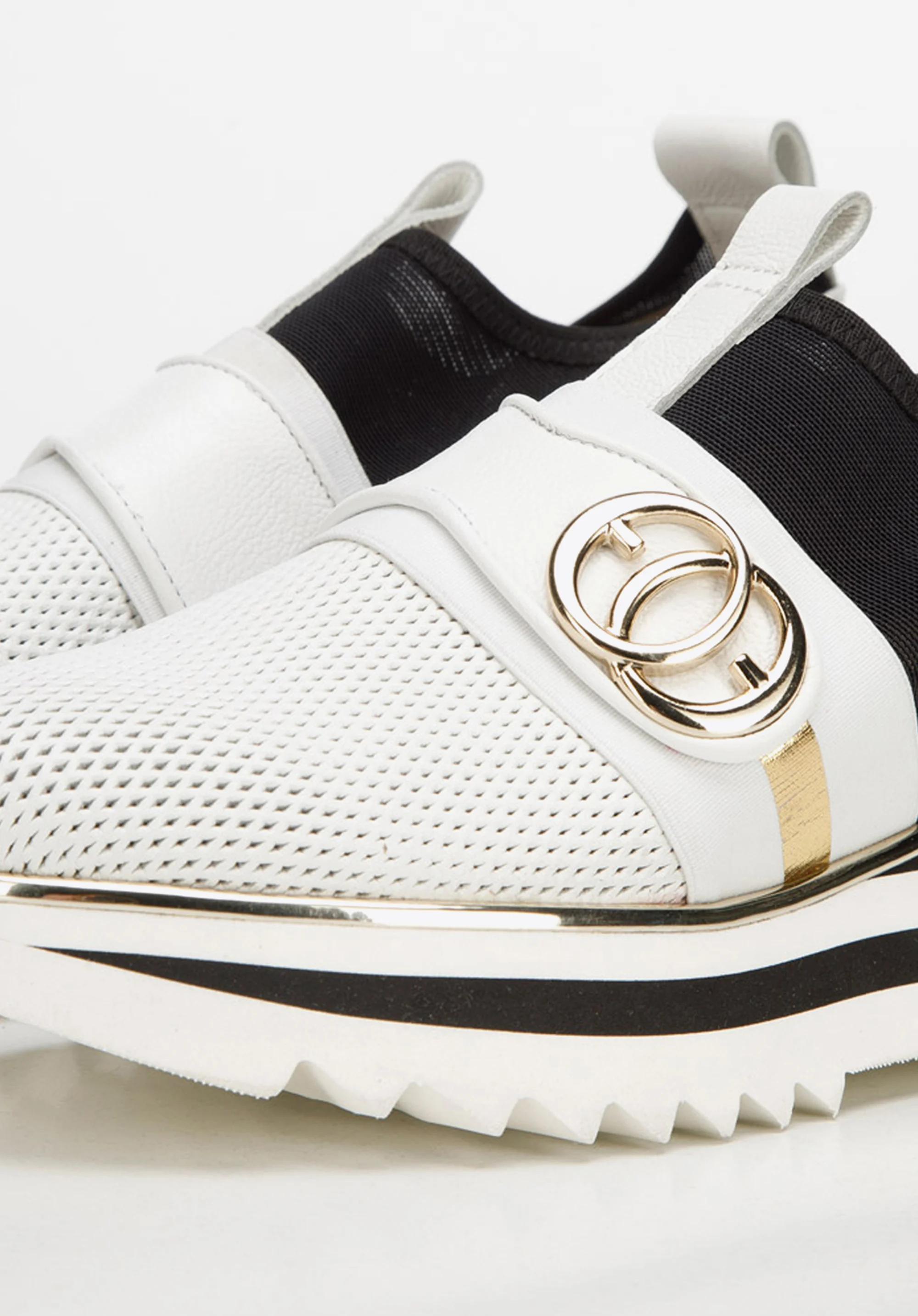 Damskie sneakersy skórzane na platformie ażurowe