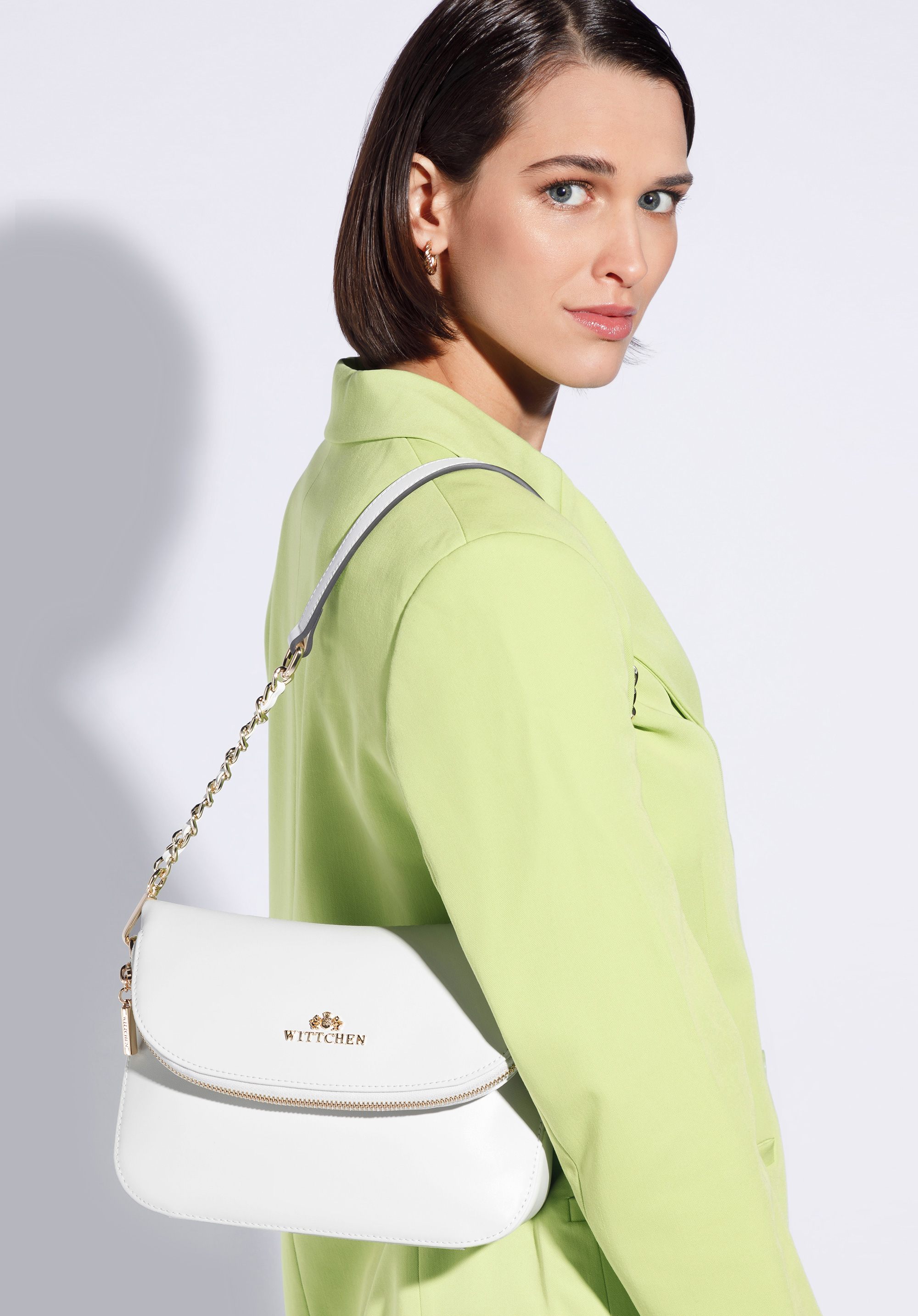 Damska listonoszka skórzana z kieszenią w klapie mała