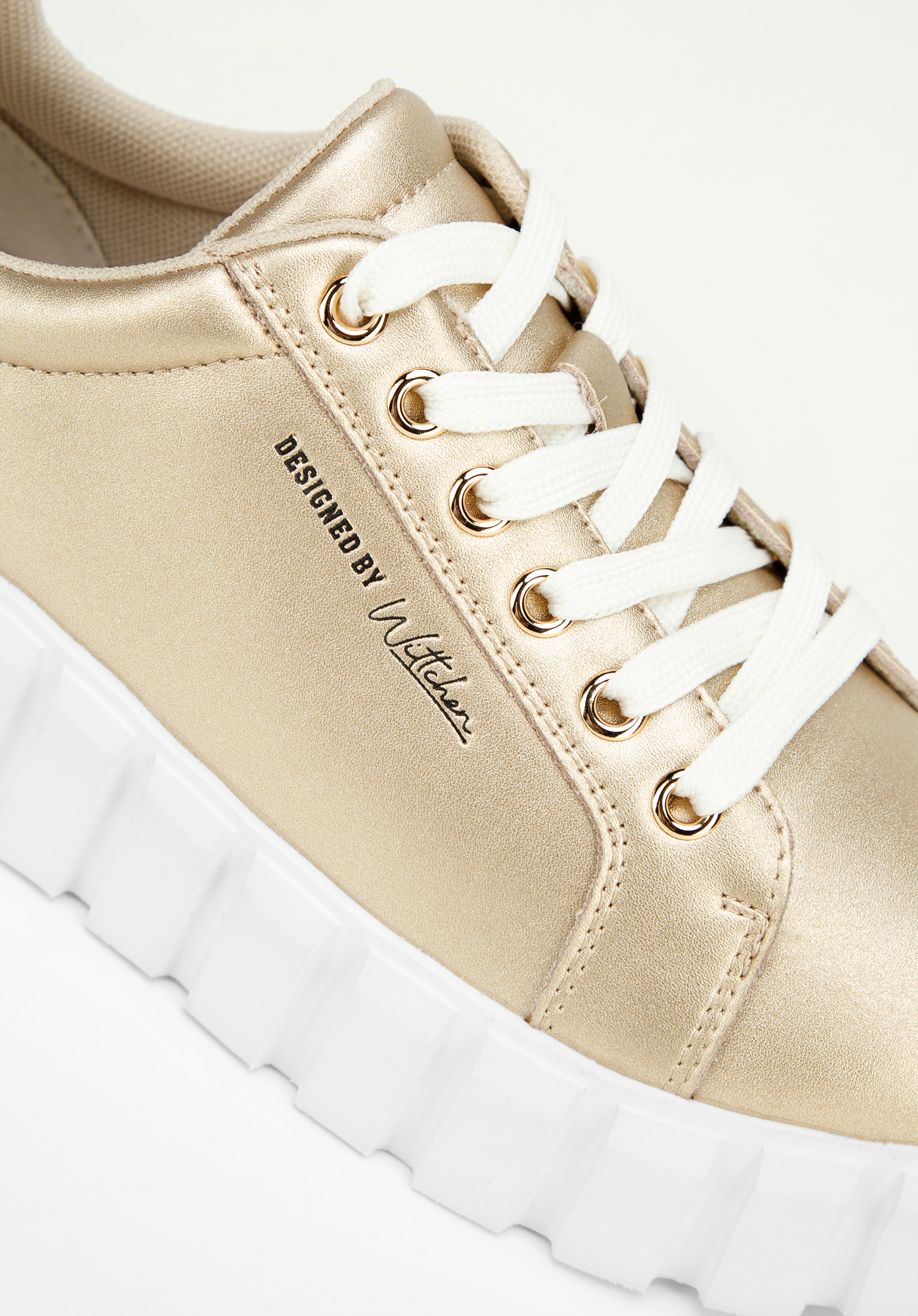 Damskie sneakersy skórzane na grubej platformie